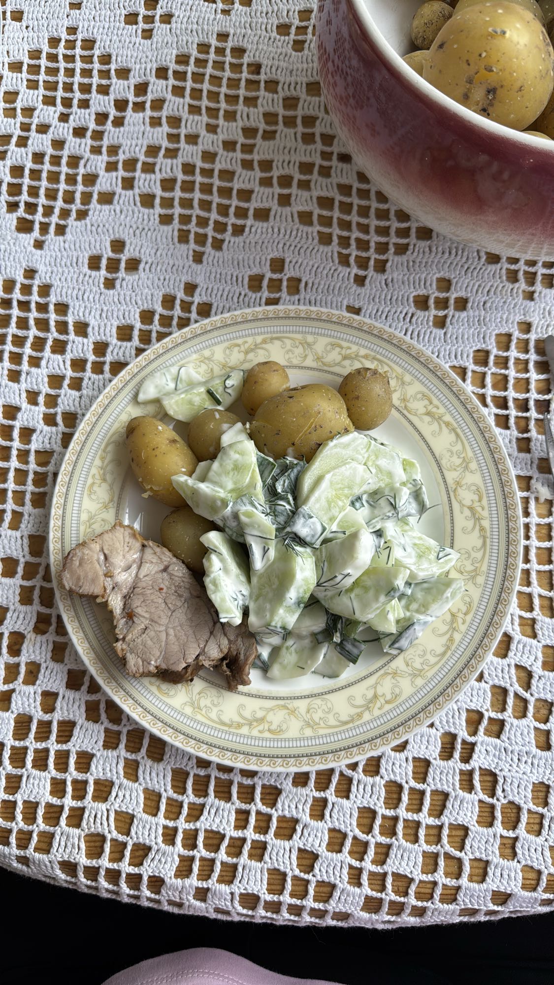 Pork, potatoes, cucumber salad