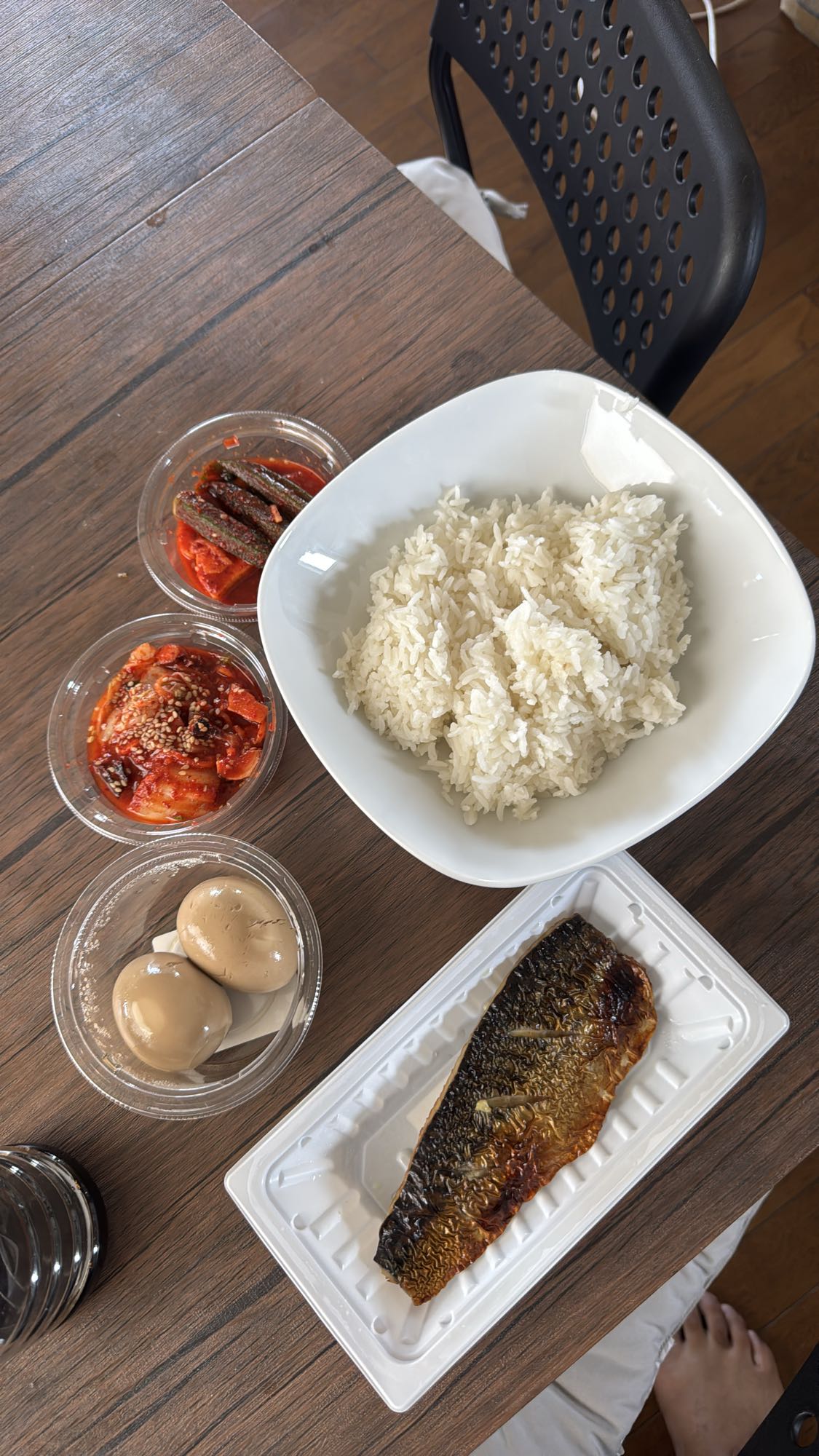 Grilled fish with rice and sides