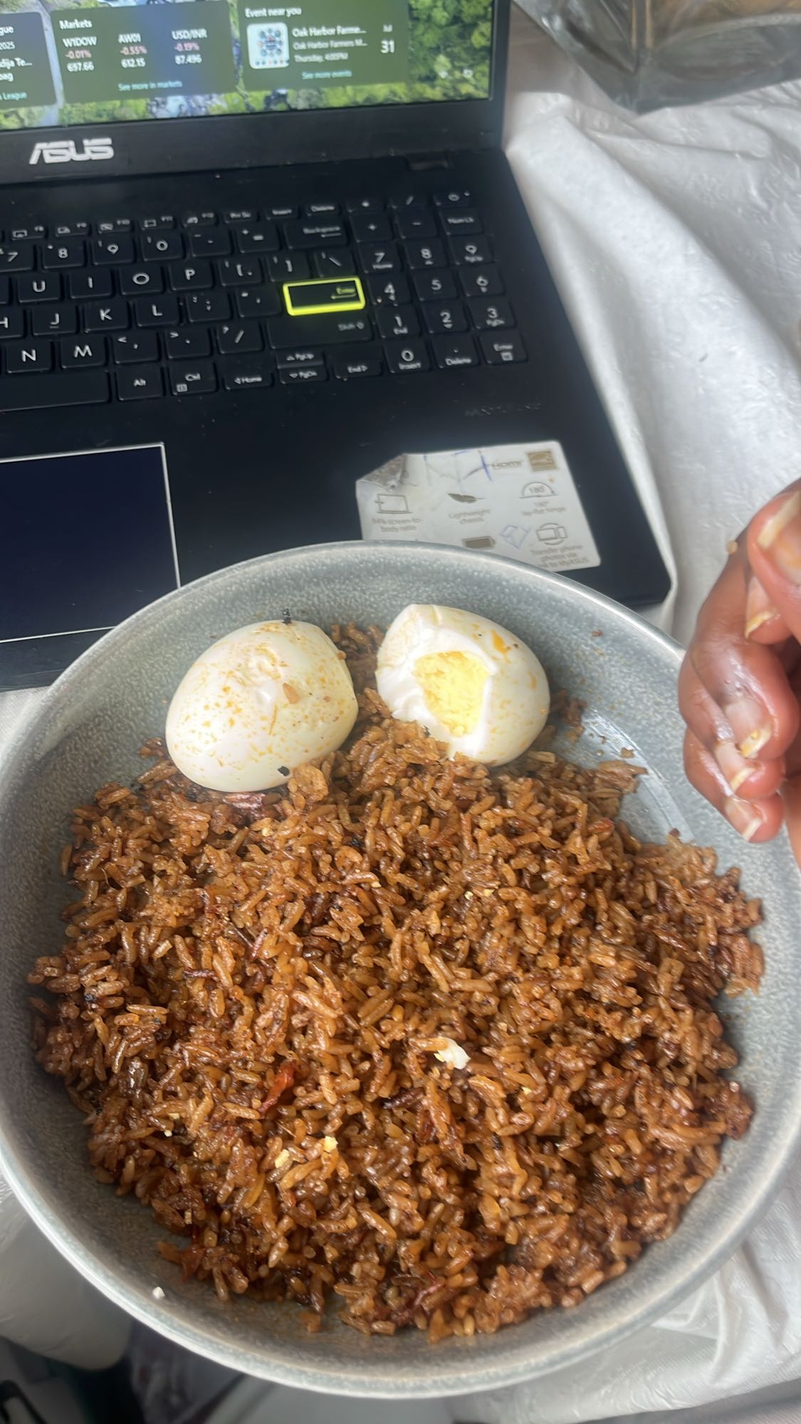 Jollof rice with boiled eggs