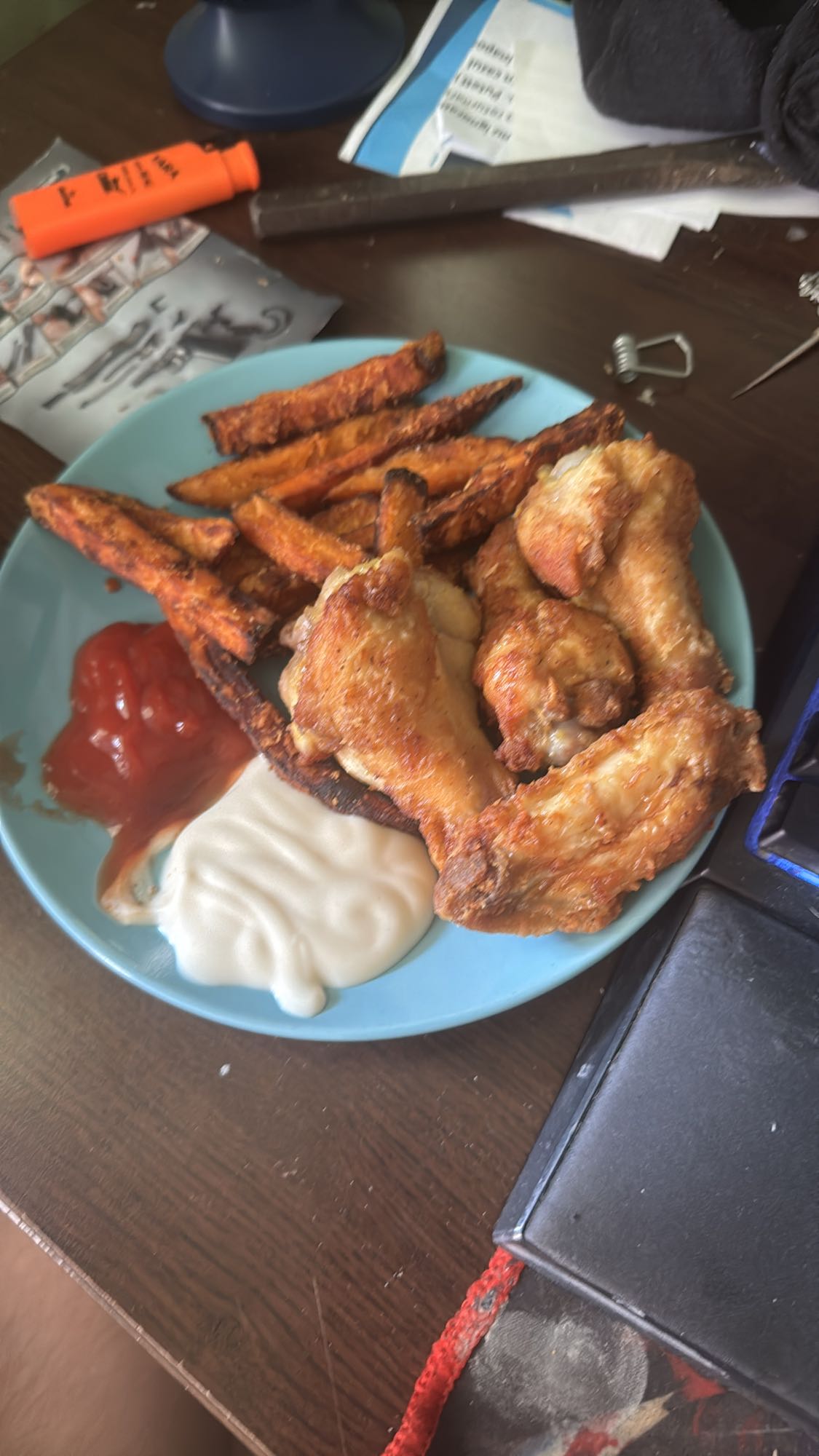 Chicken wings and fries