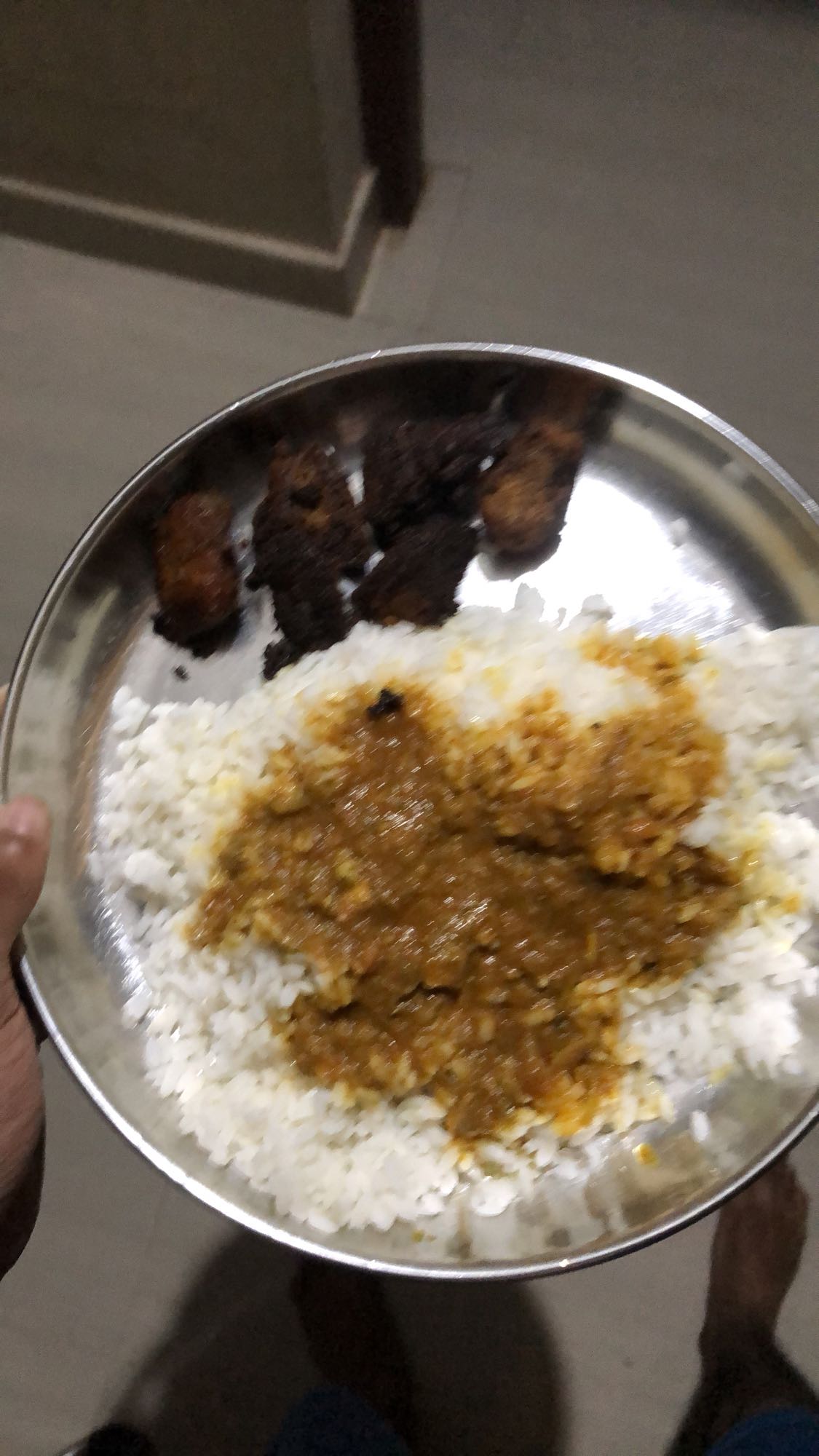 Rice with dal and fried fish