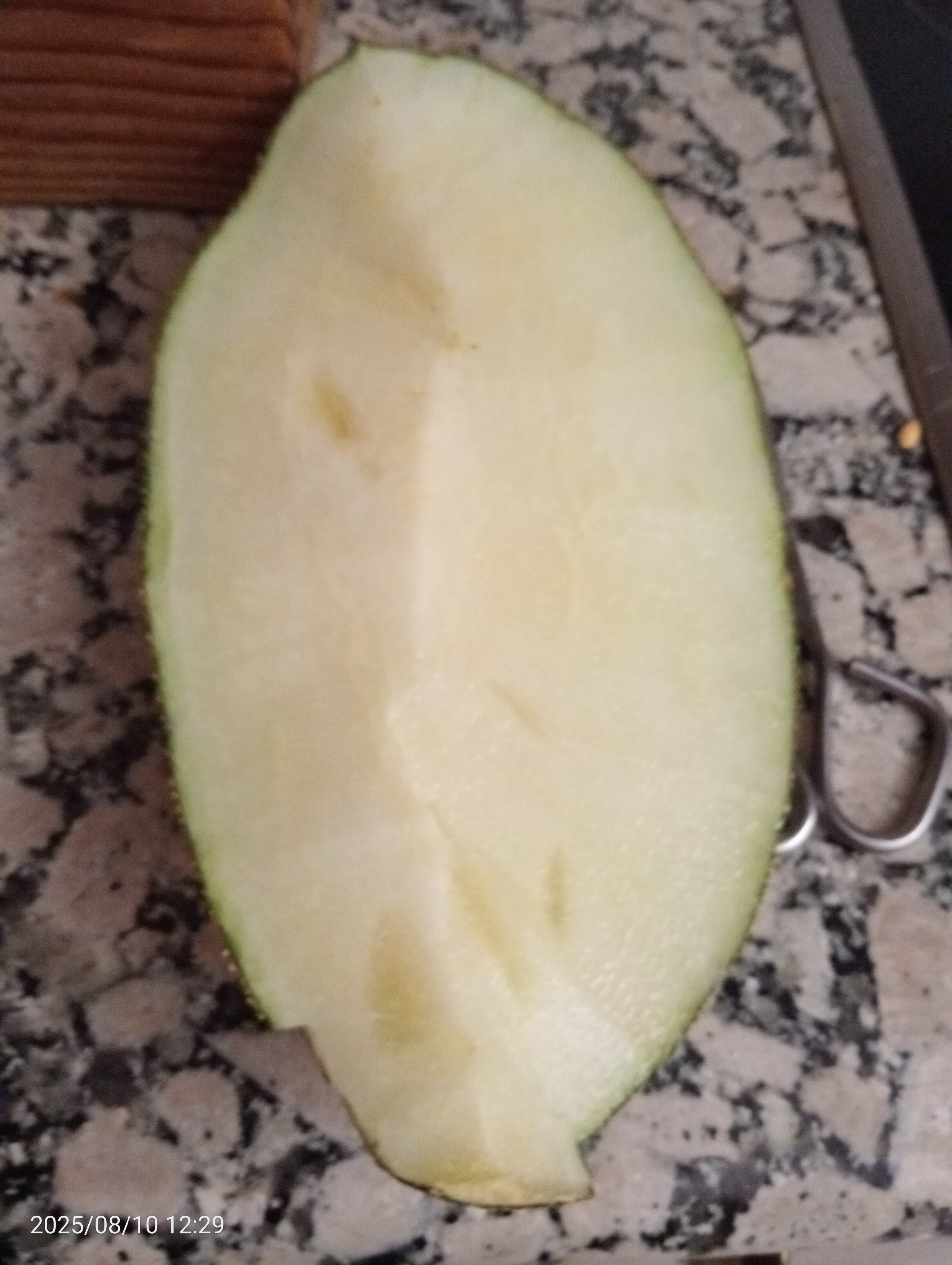 Rodaja de mango verde