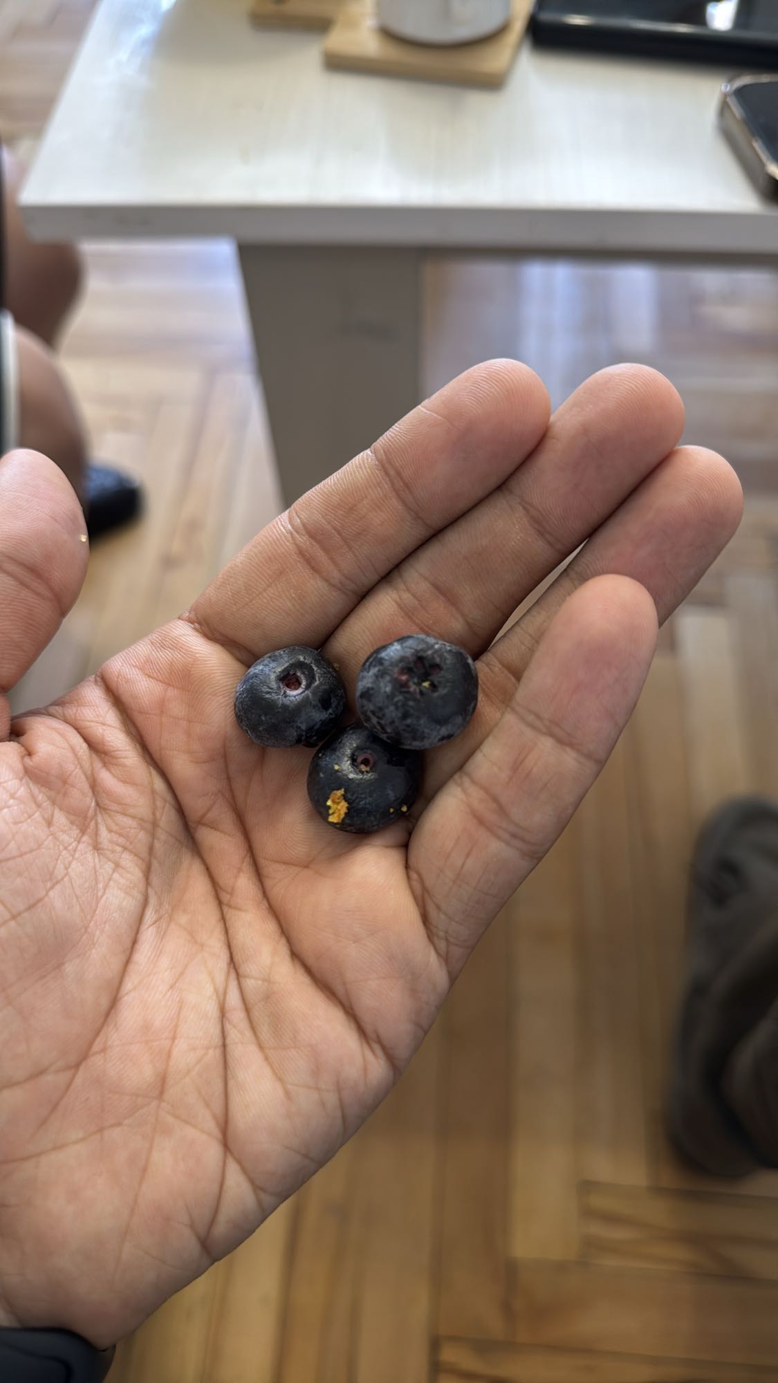 Three blueberries
