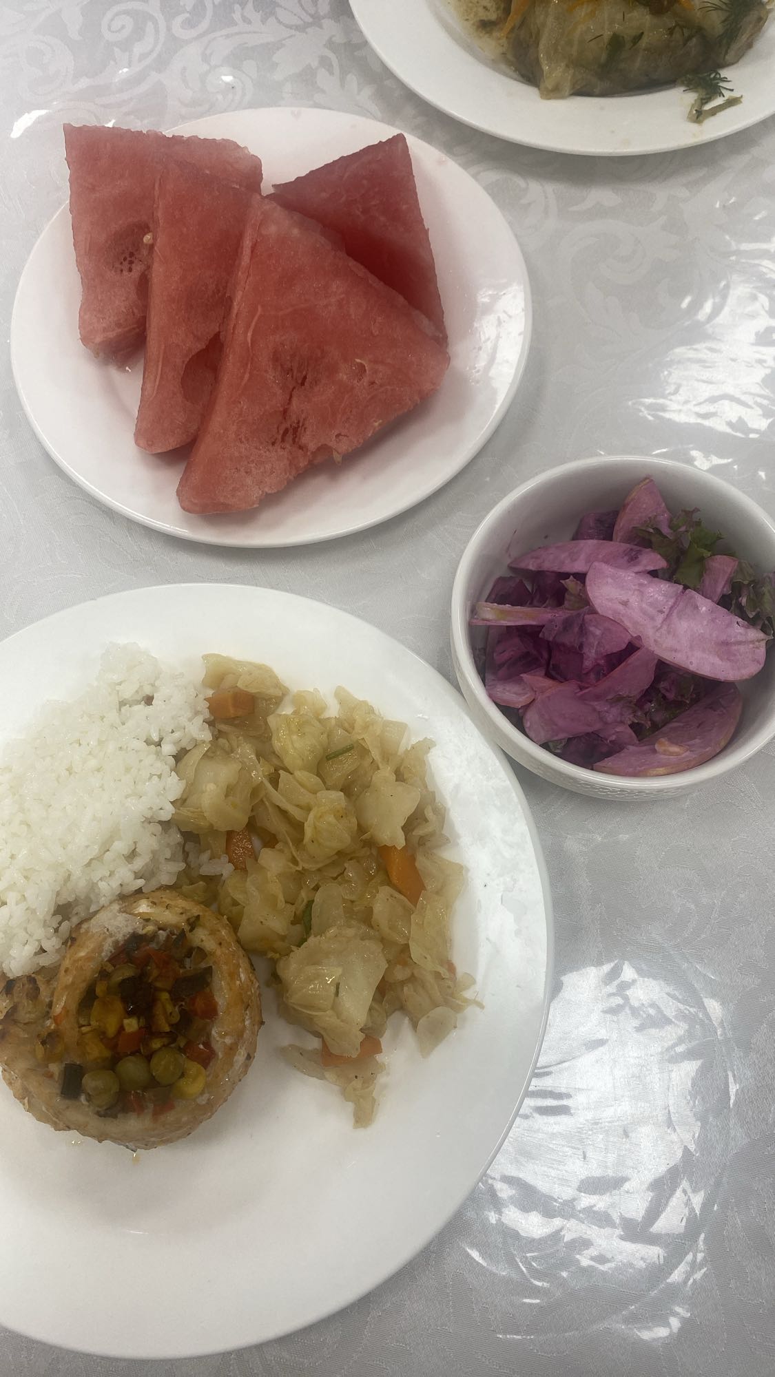 Stuffed chicken, rice, salad, fruit