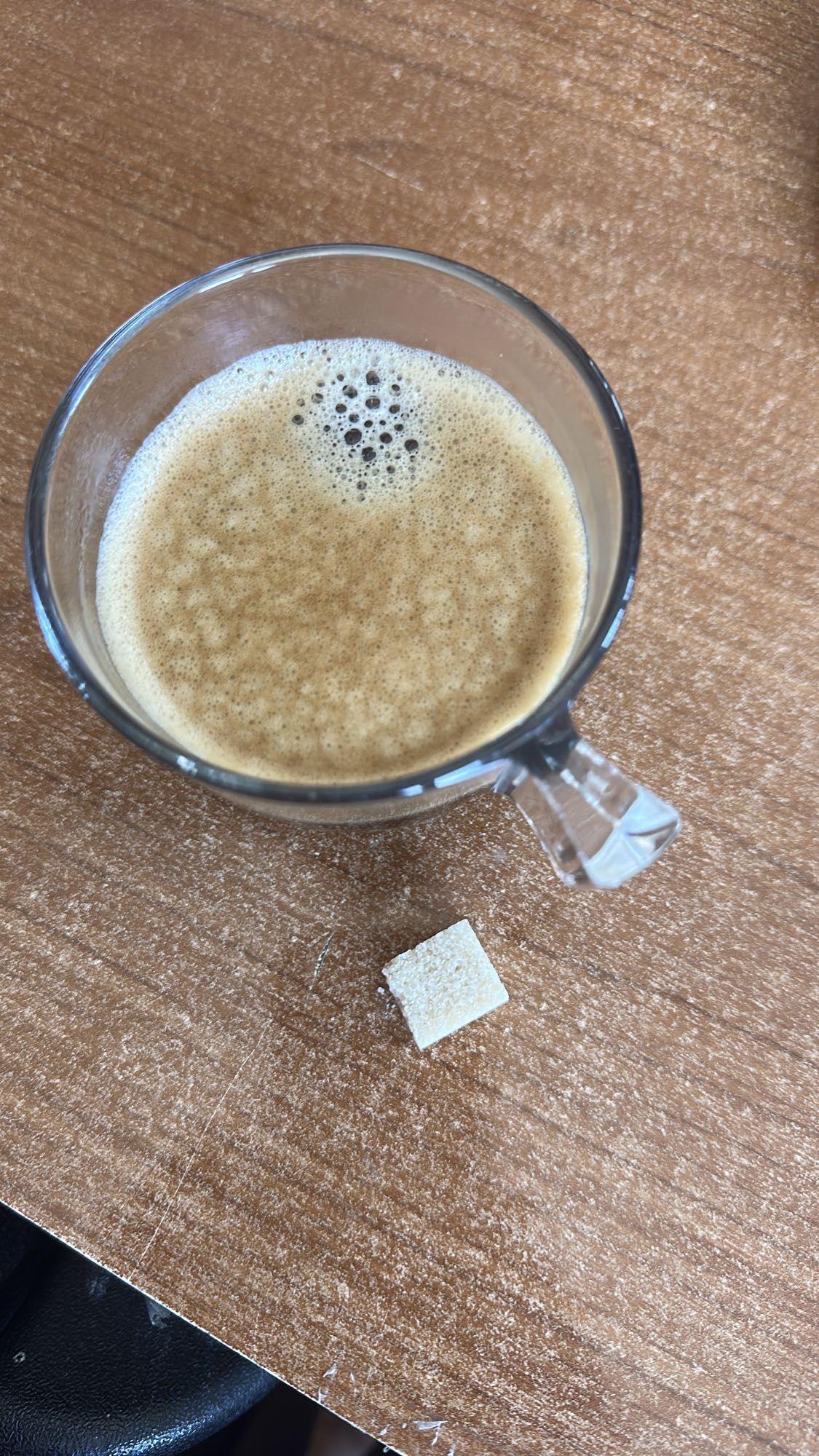Coffee with sugar cube