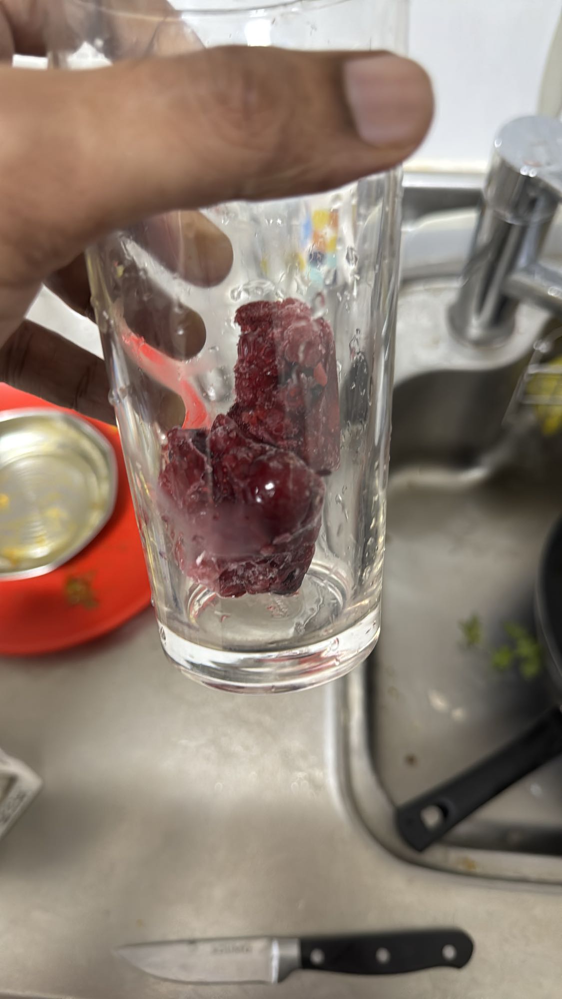 Frozen berries in glass