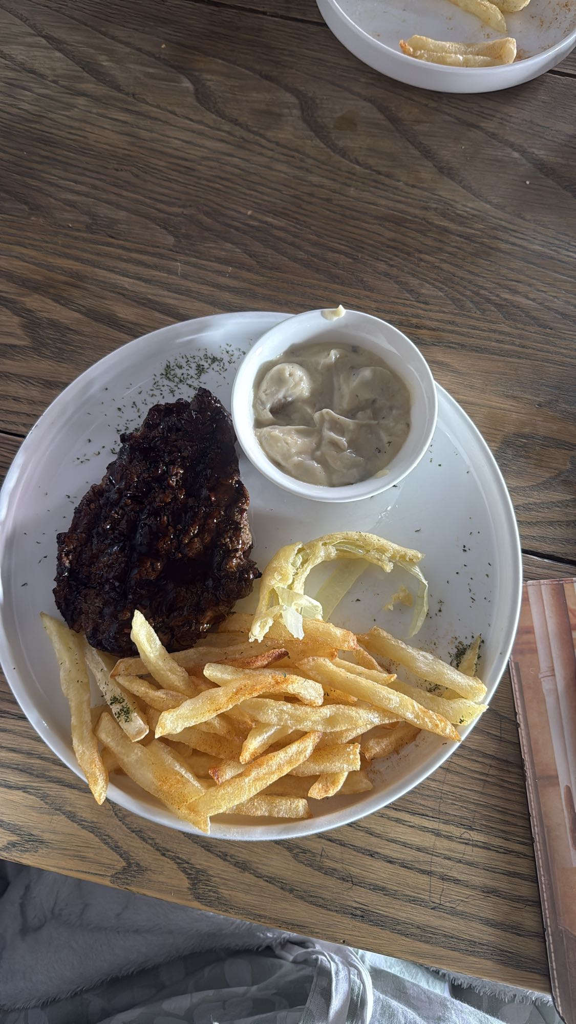 Steak with fries and sauce