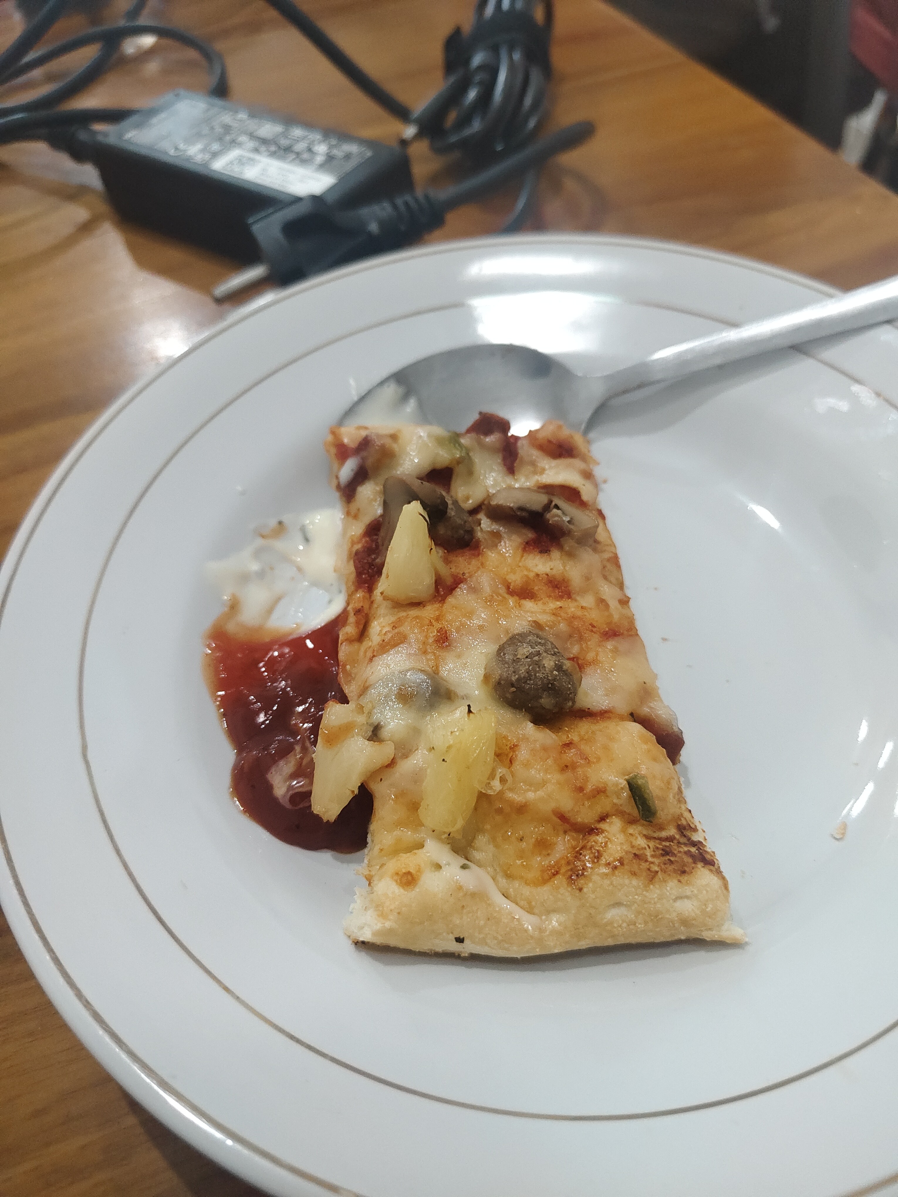 Pizza slice with sauces