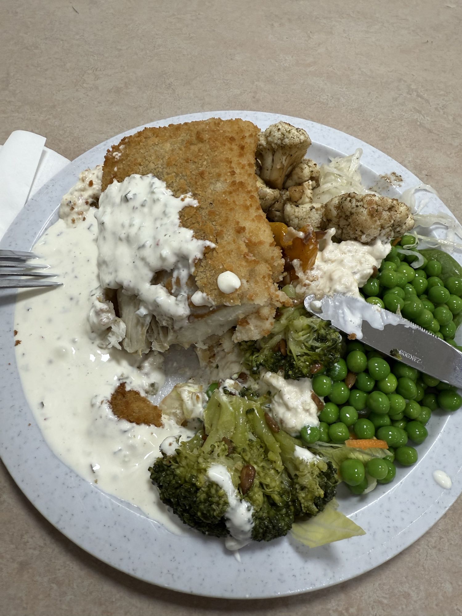 Panerad fisk med grönsaker