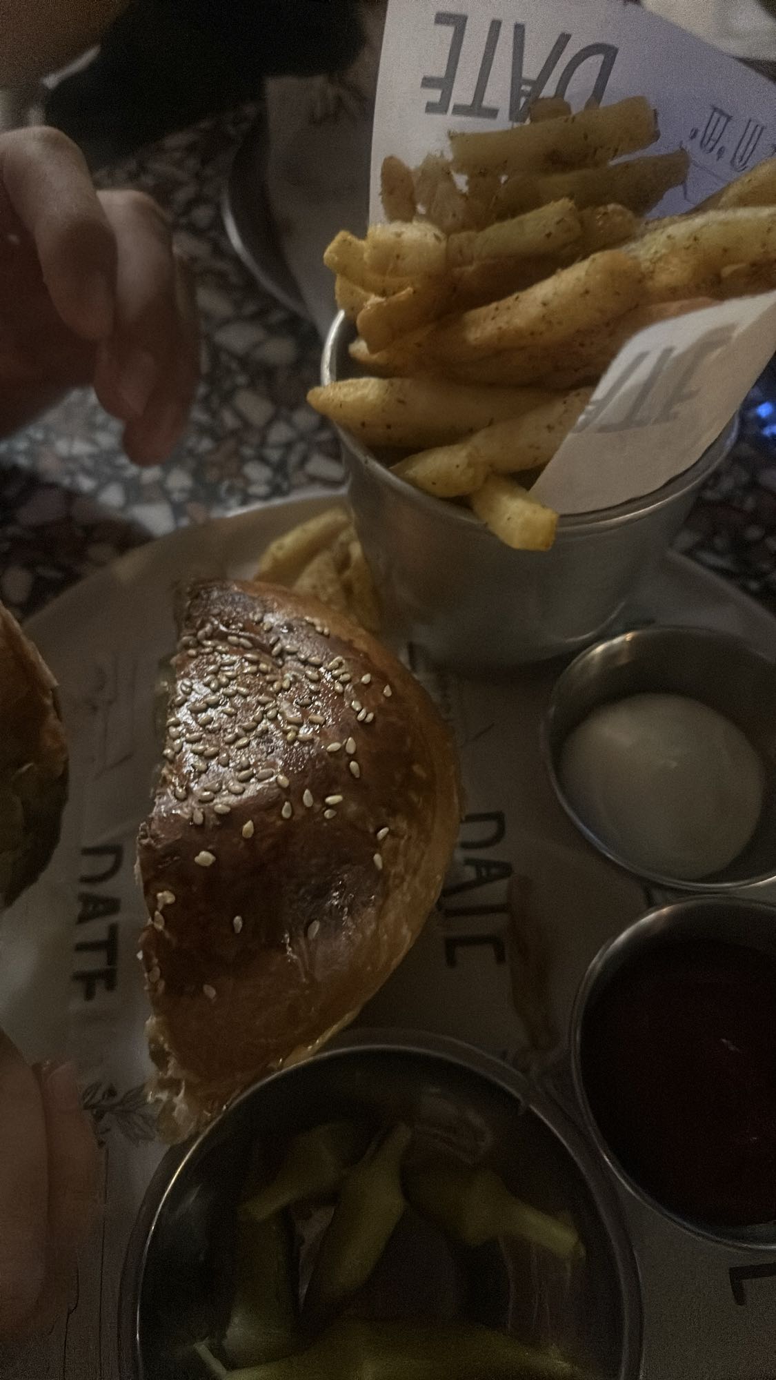 Half burger with fries and dips