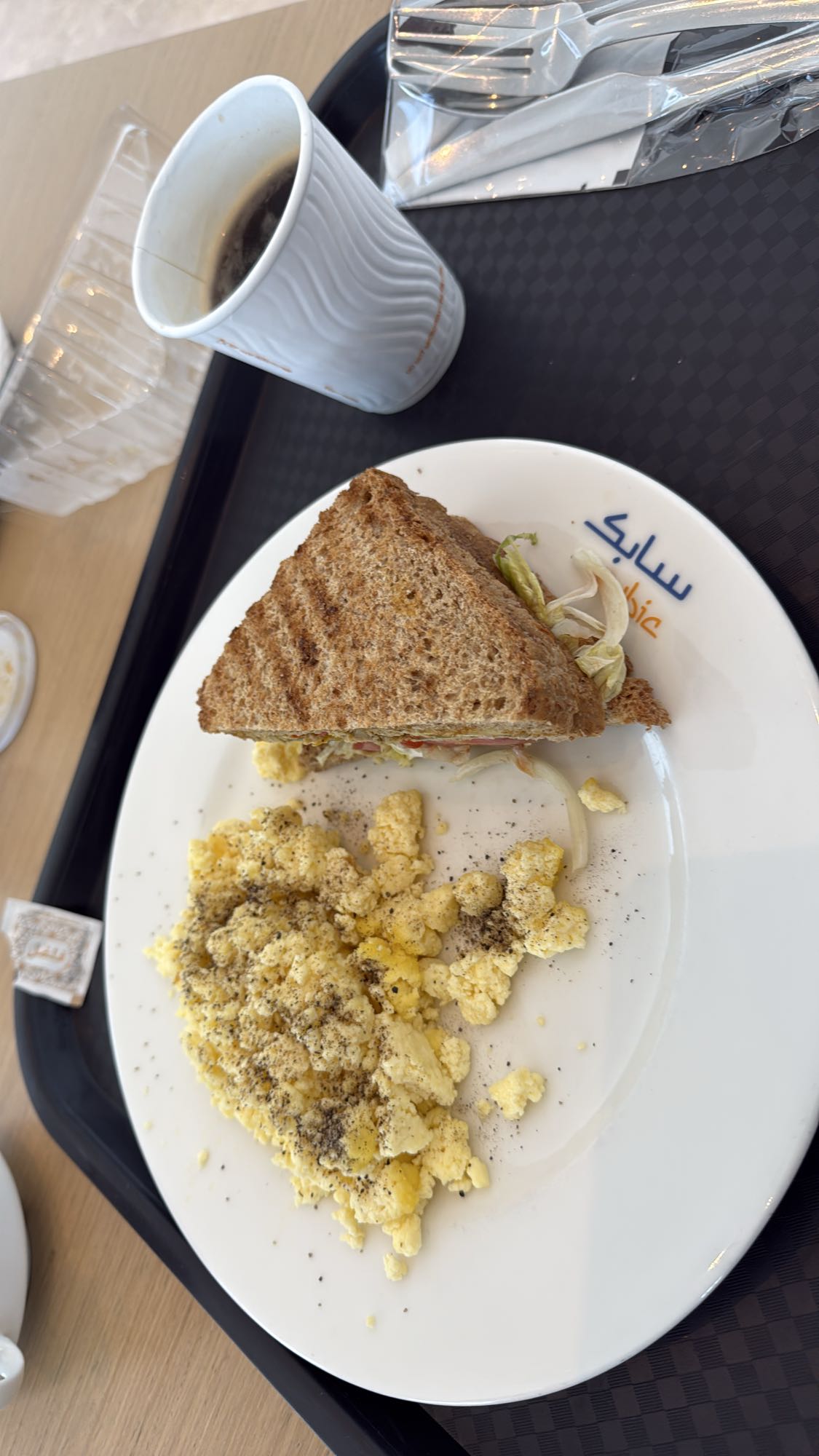 Scrambled eggs & sandwich