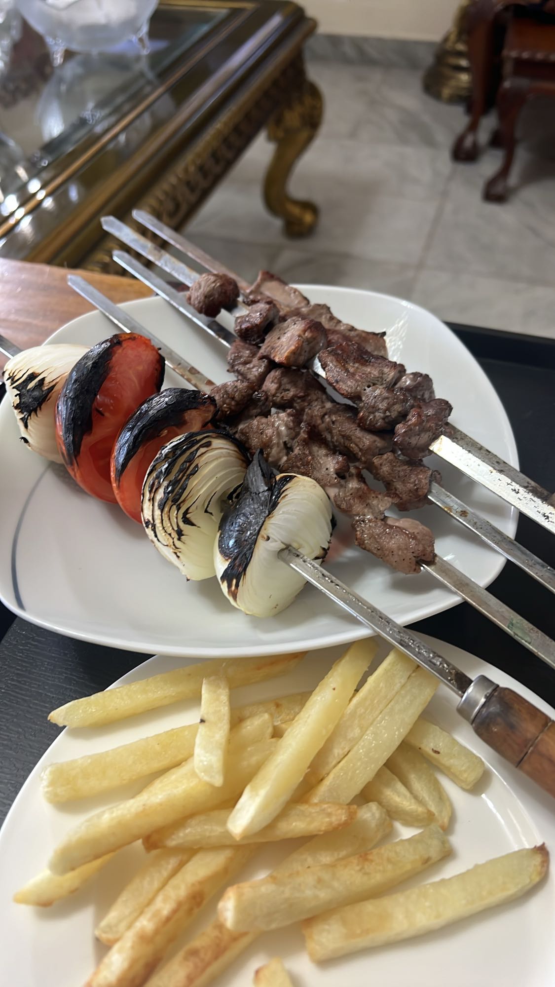 Kebab with fries and veggies