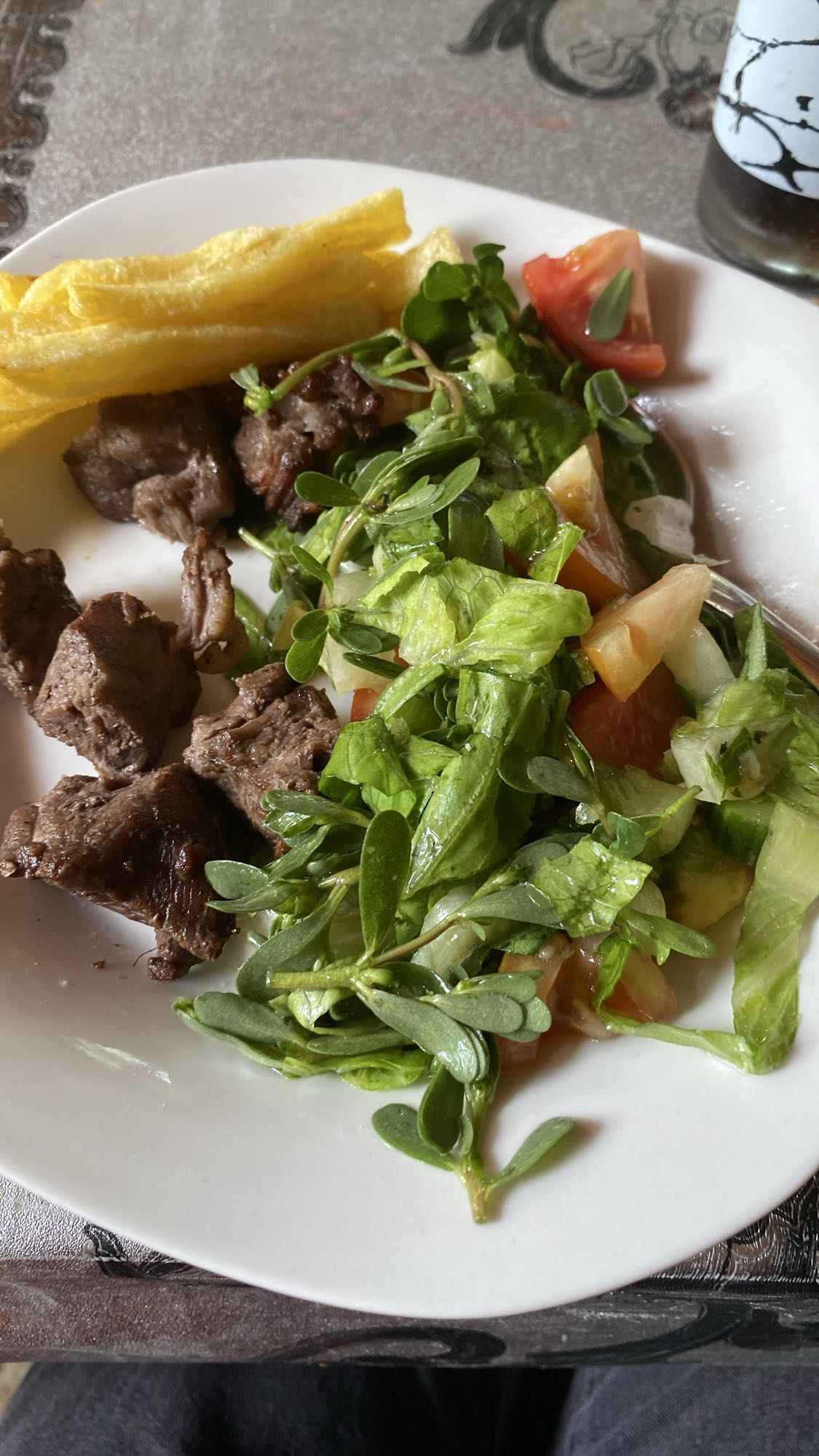 Beef, fries and salad plate