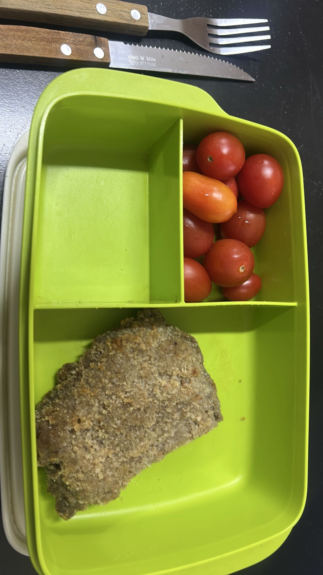 Milanesa con tomates