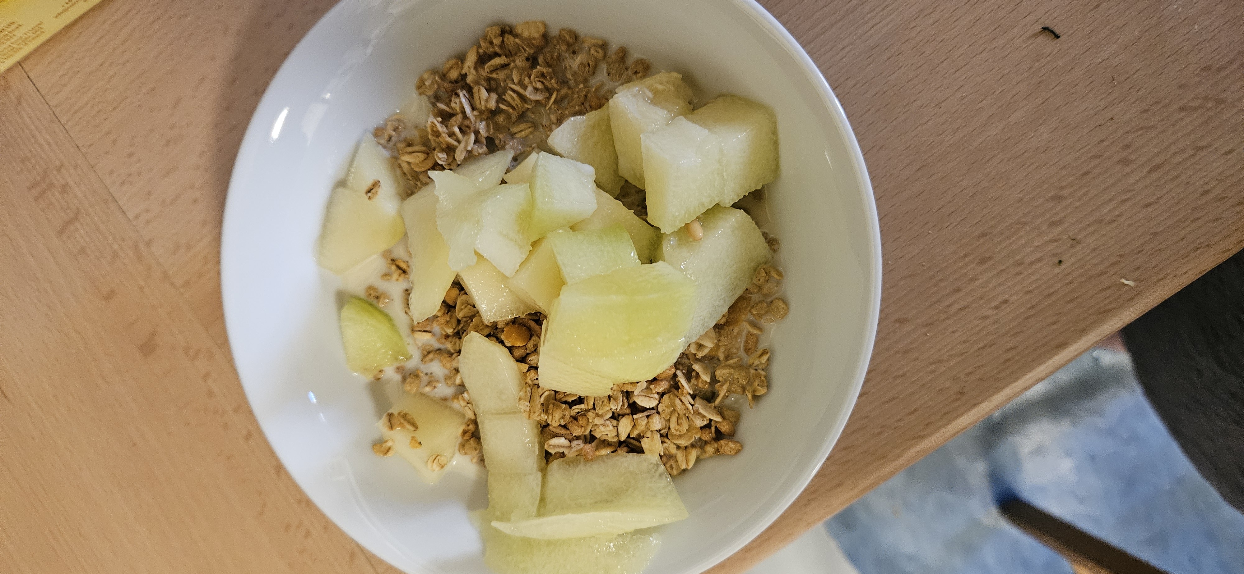 Granola with melon and milk