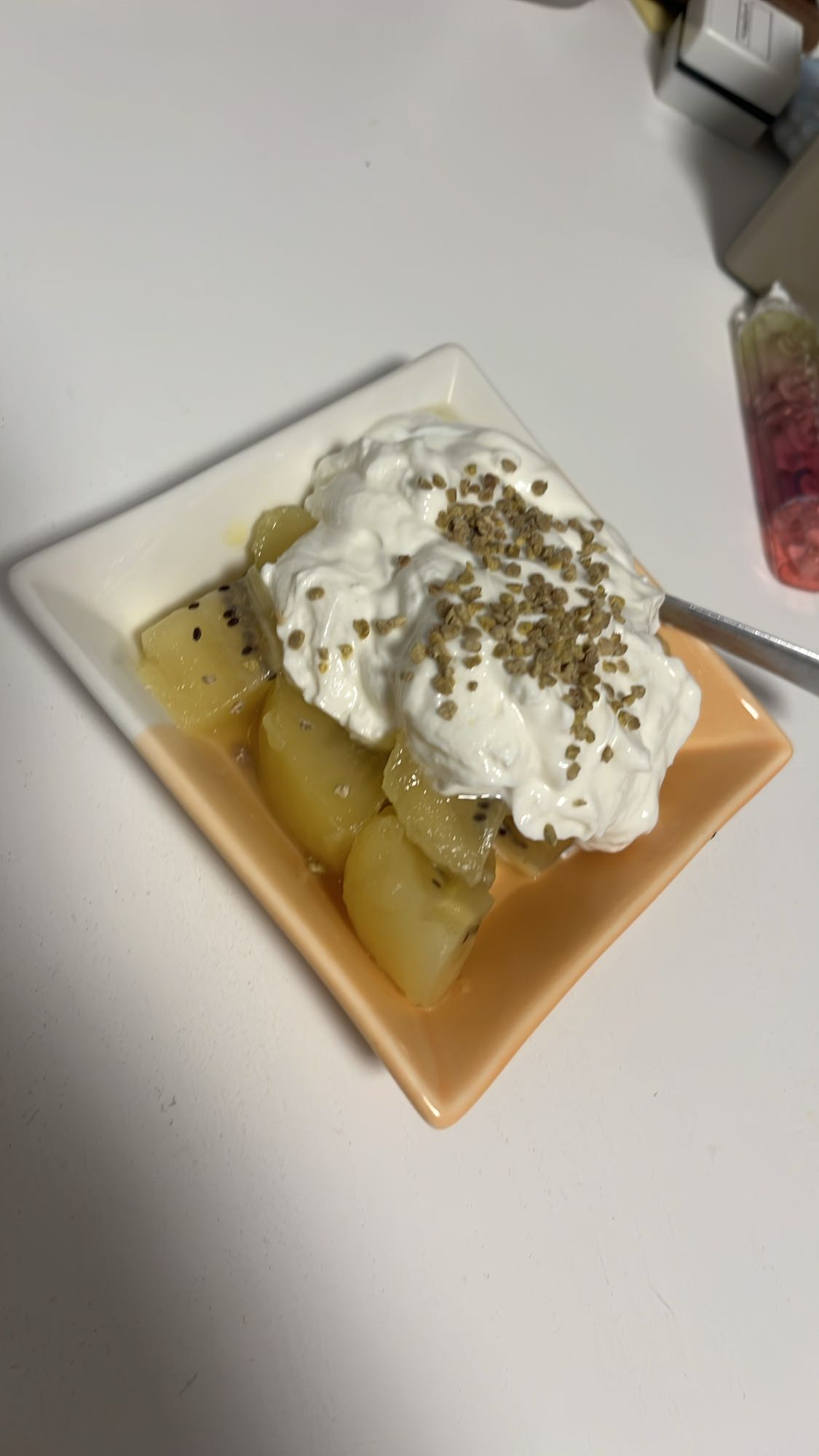 Yogurt with pineapple and seeds