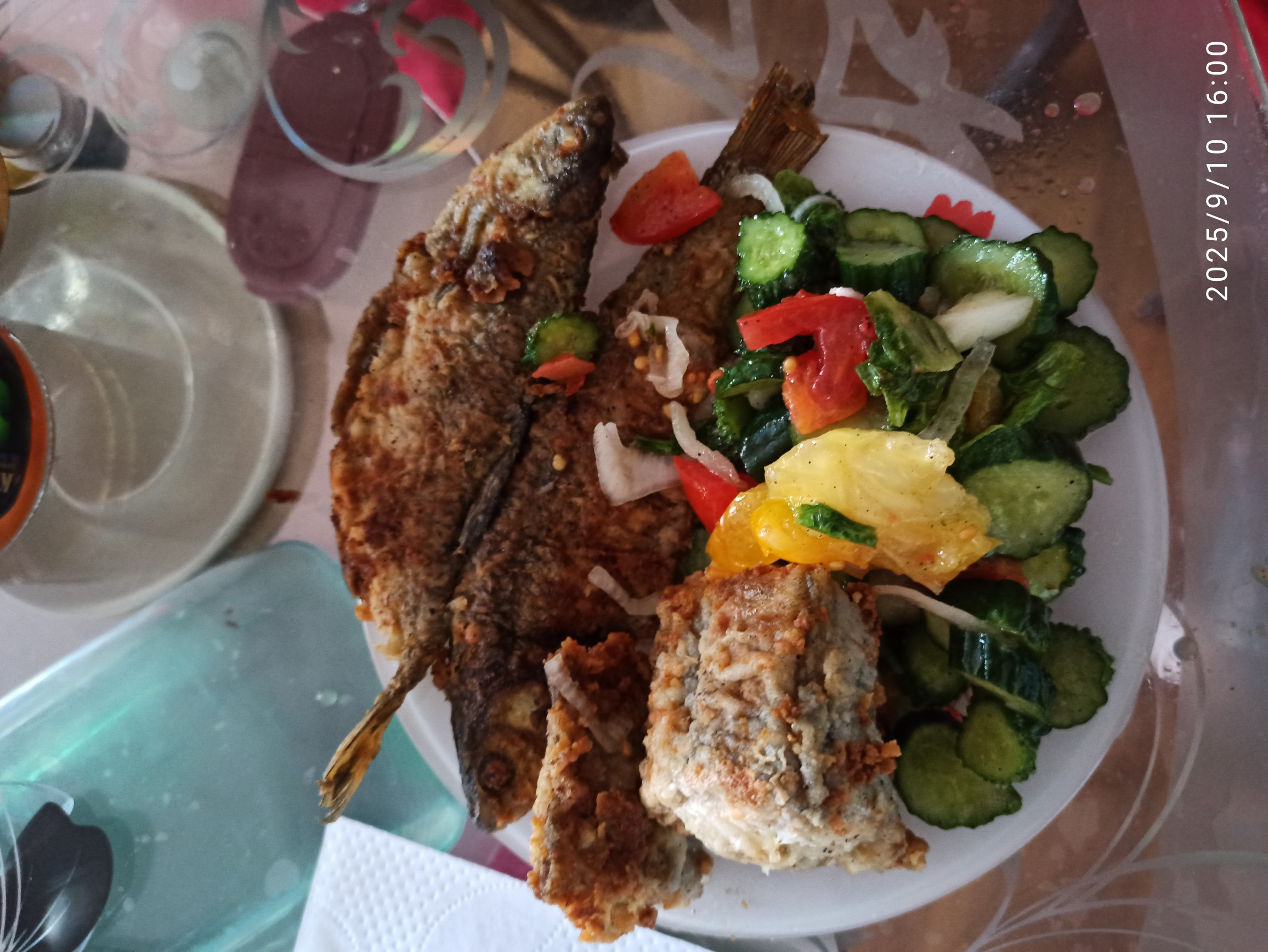 Fried fish with salad