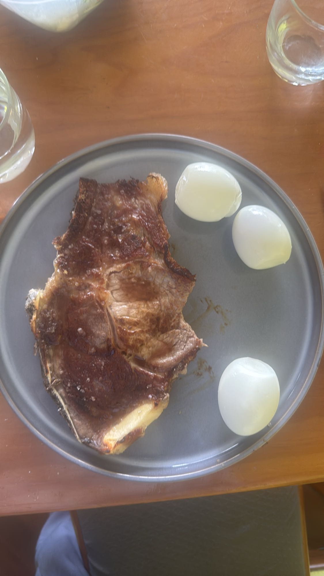 Bistec con cebolla cocida