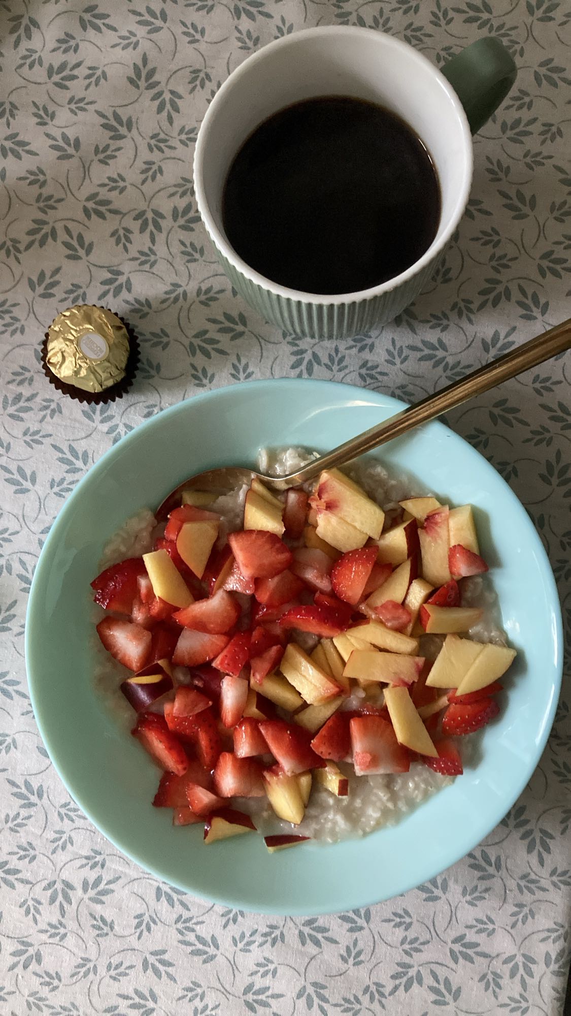 Oatmeal with fruit and coffee
