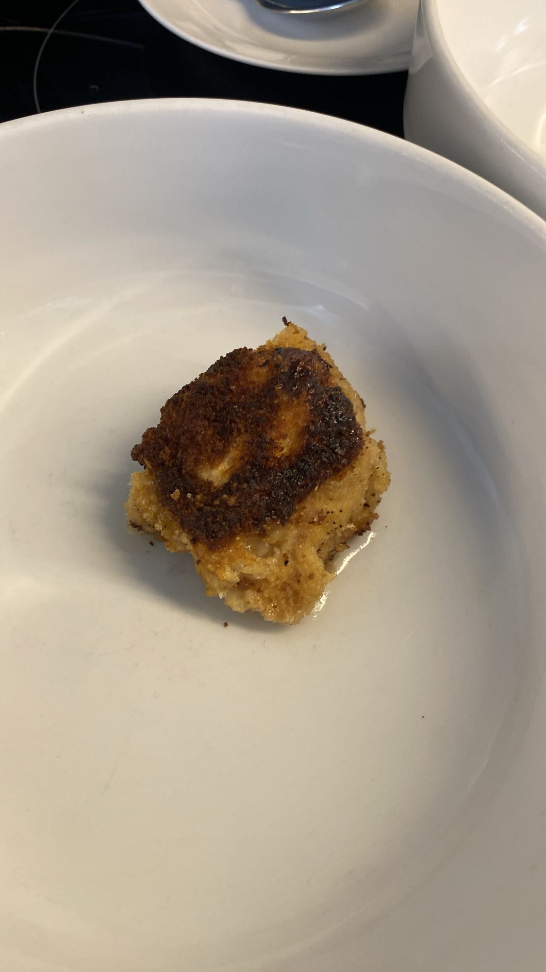 Panerad schnitzel med fläsk och ost