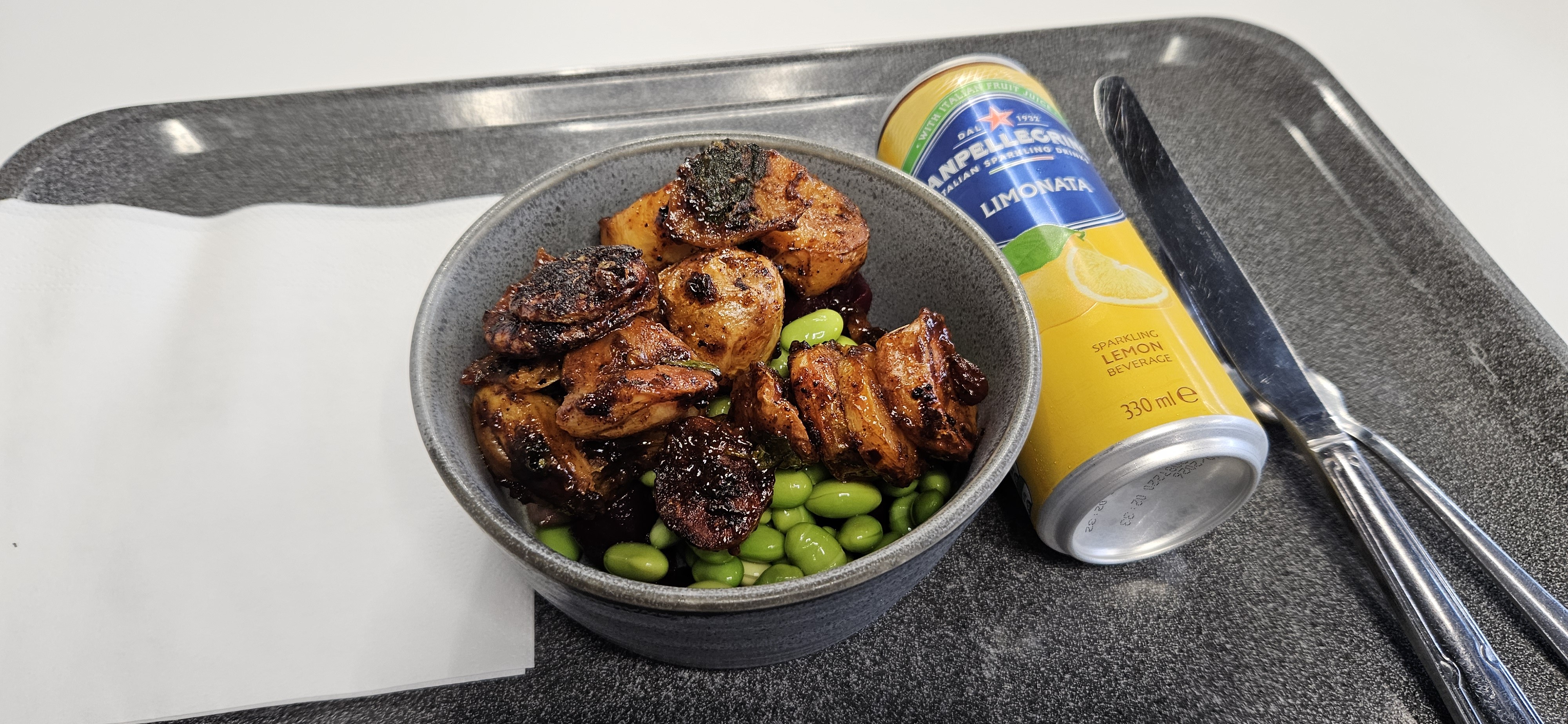 Spicy potatoes bowl with edamame and lemon soda