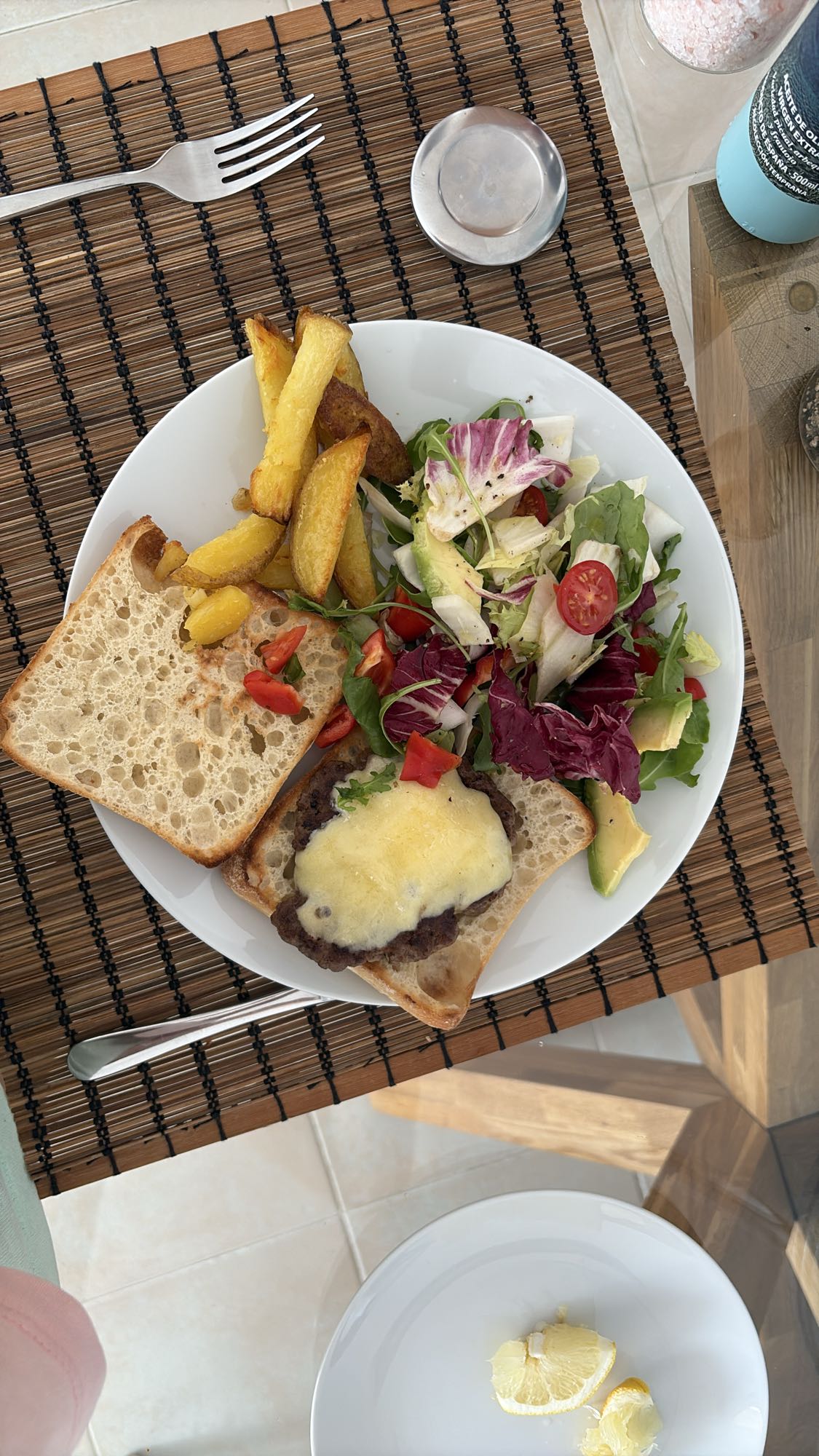 Cheeseburger with fries and salad