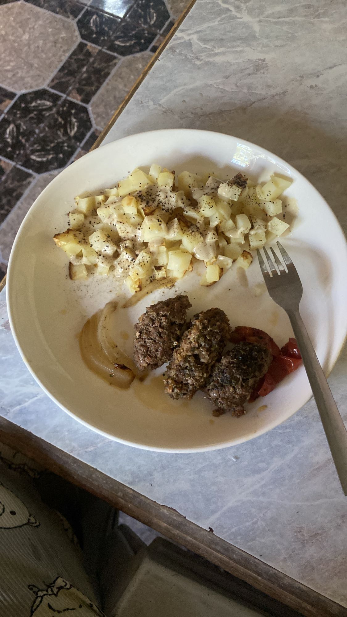 Baked potatoes and meatballs