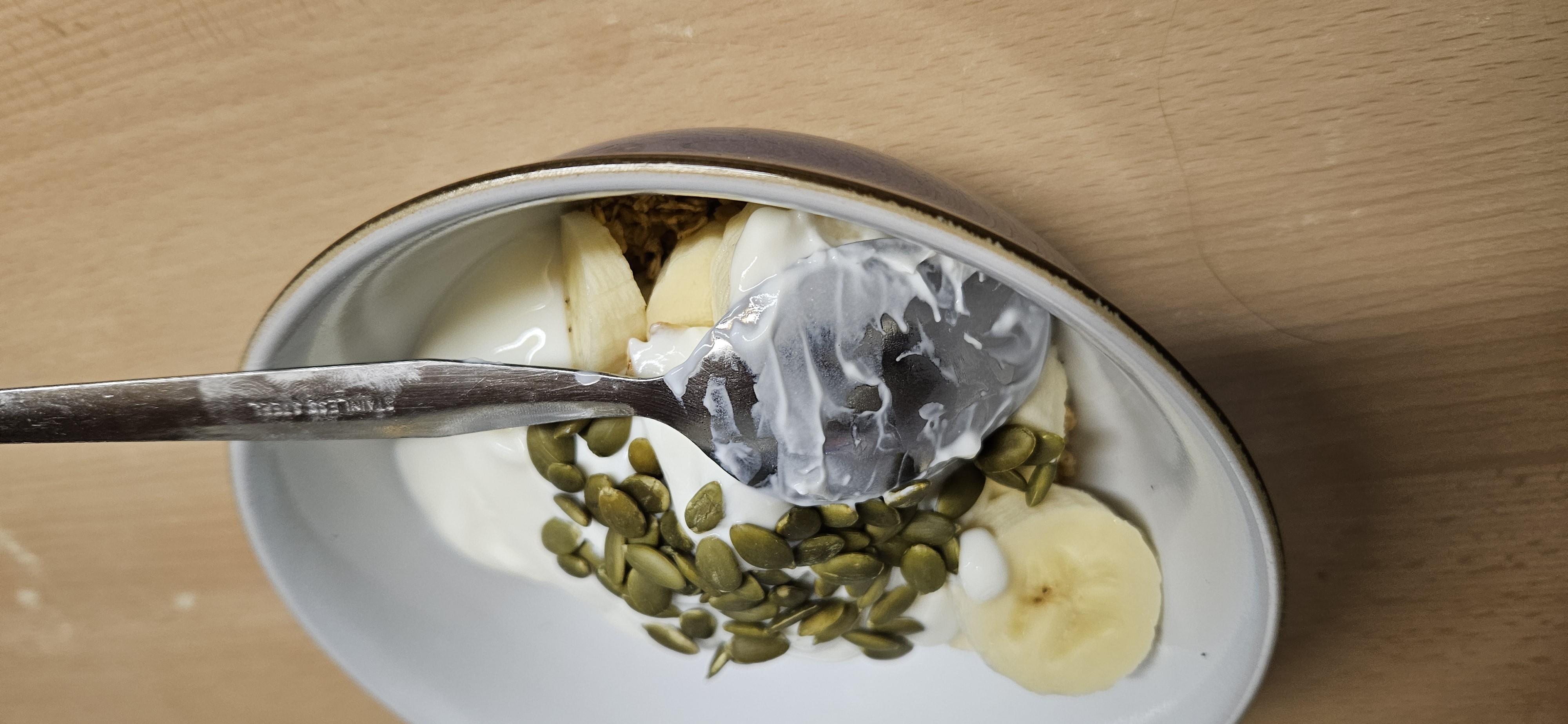 Yogurt banana granola bowl