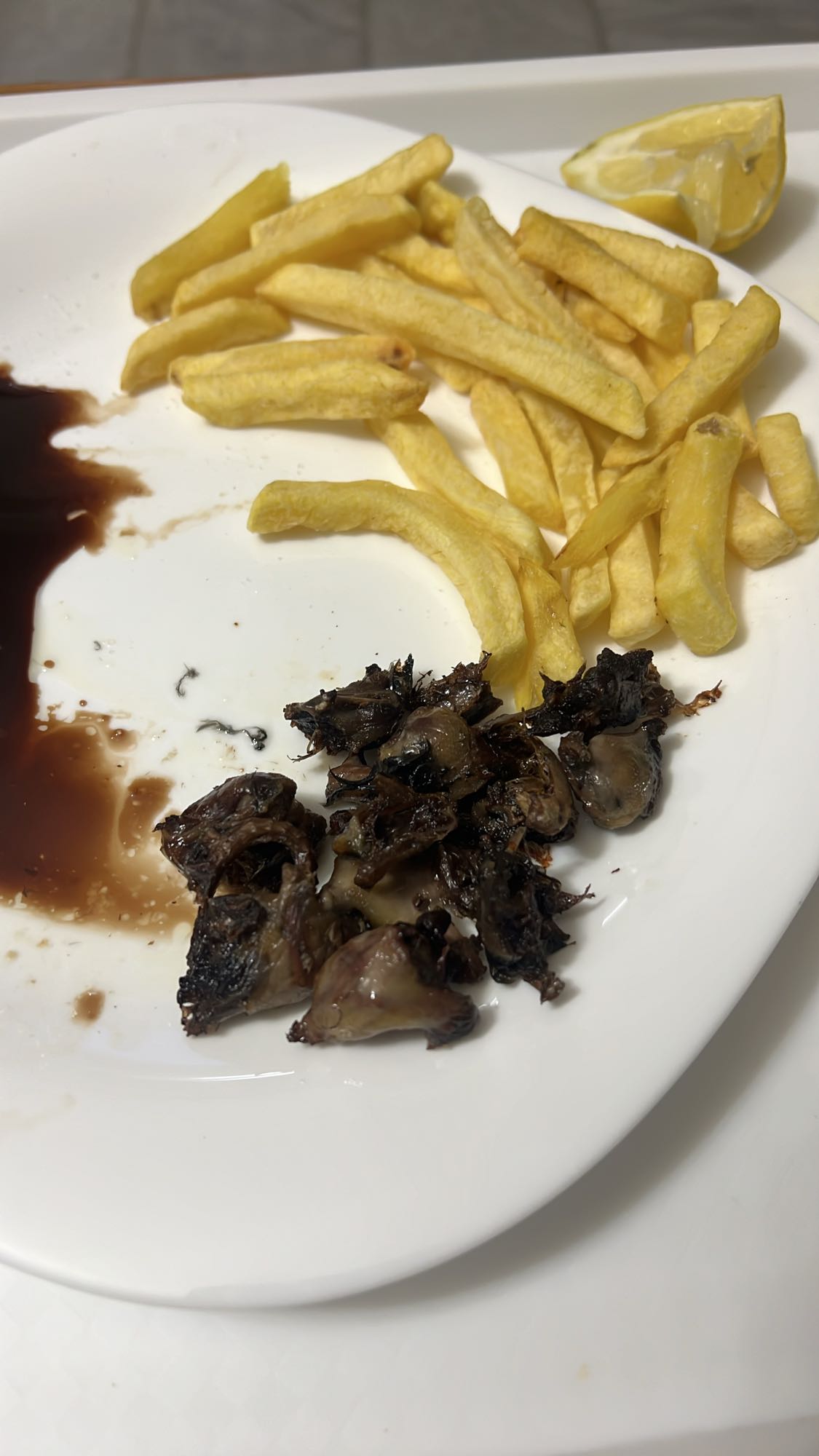 Fried potatoes and gizzards