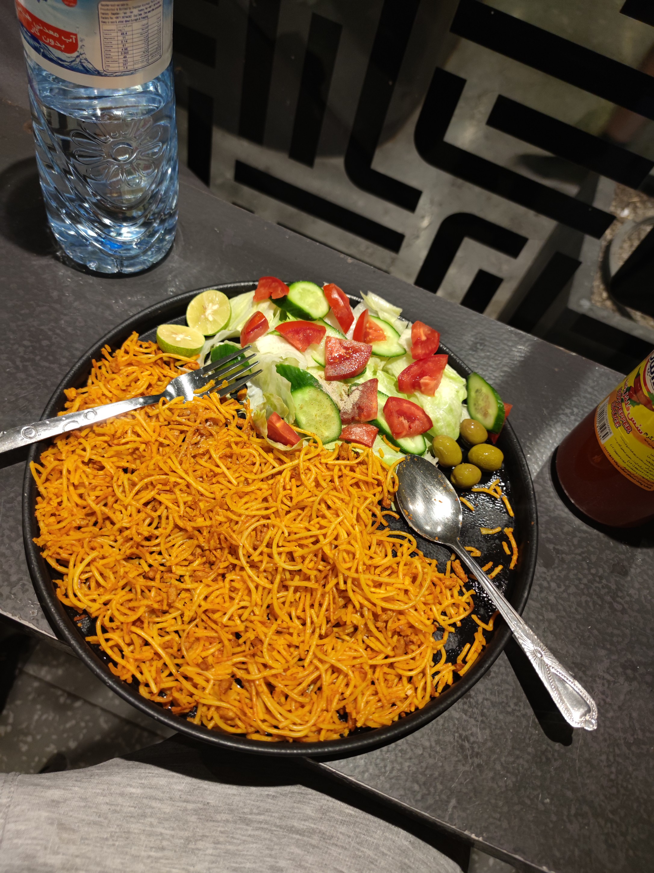 Spaghetti with salad