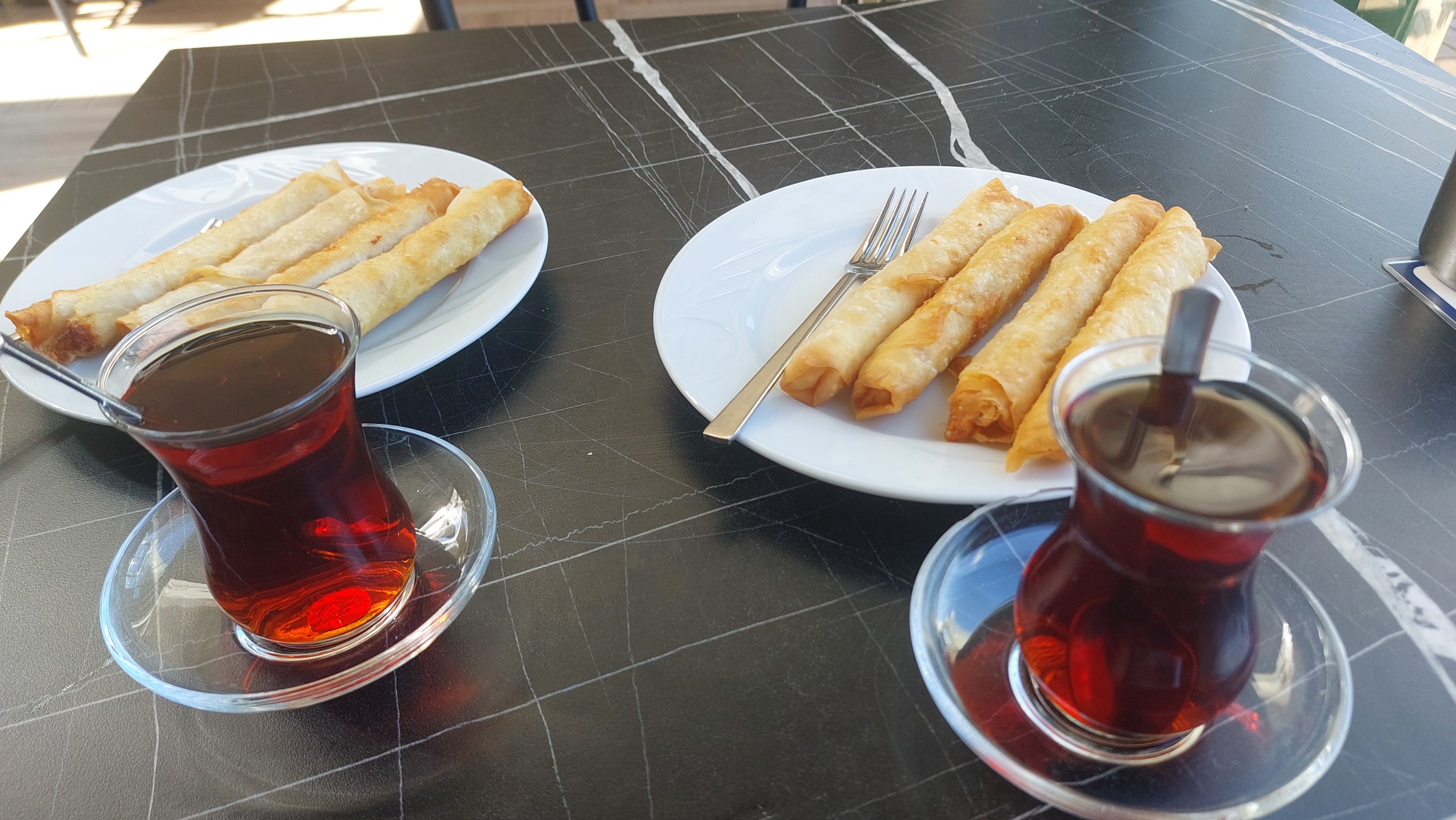 Fried rolls and tea
