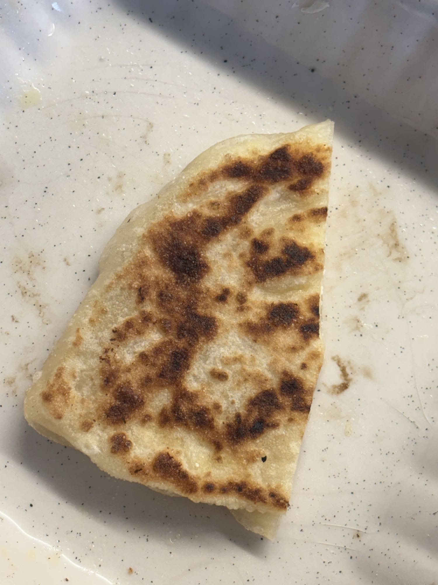 Pan-fried flatbread slice