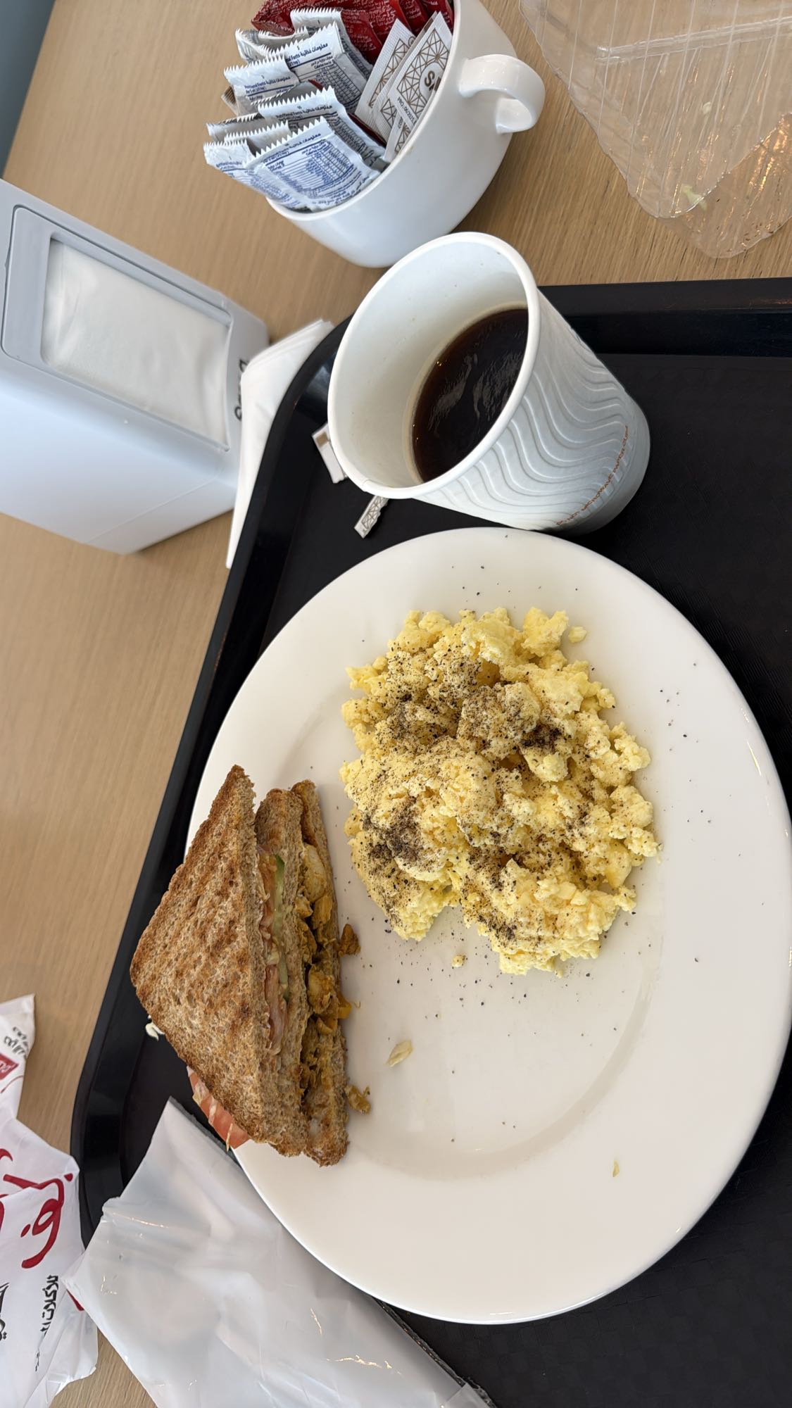 Scrambled eggs & sandwich