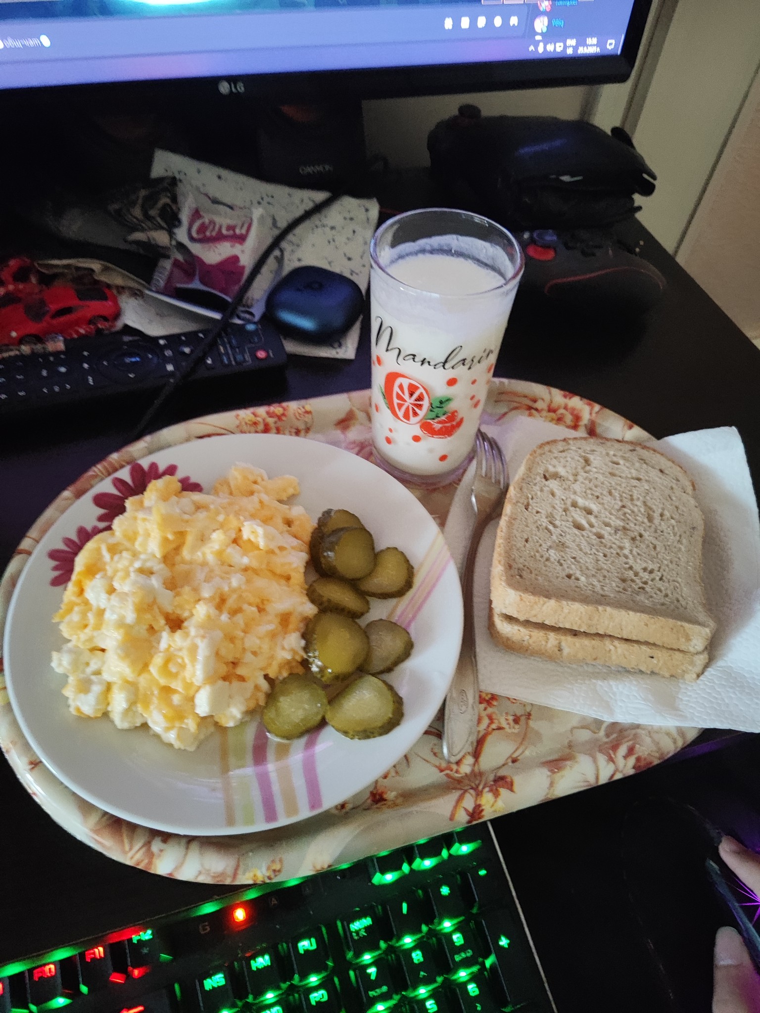 Scrambled eggs, bread, milk