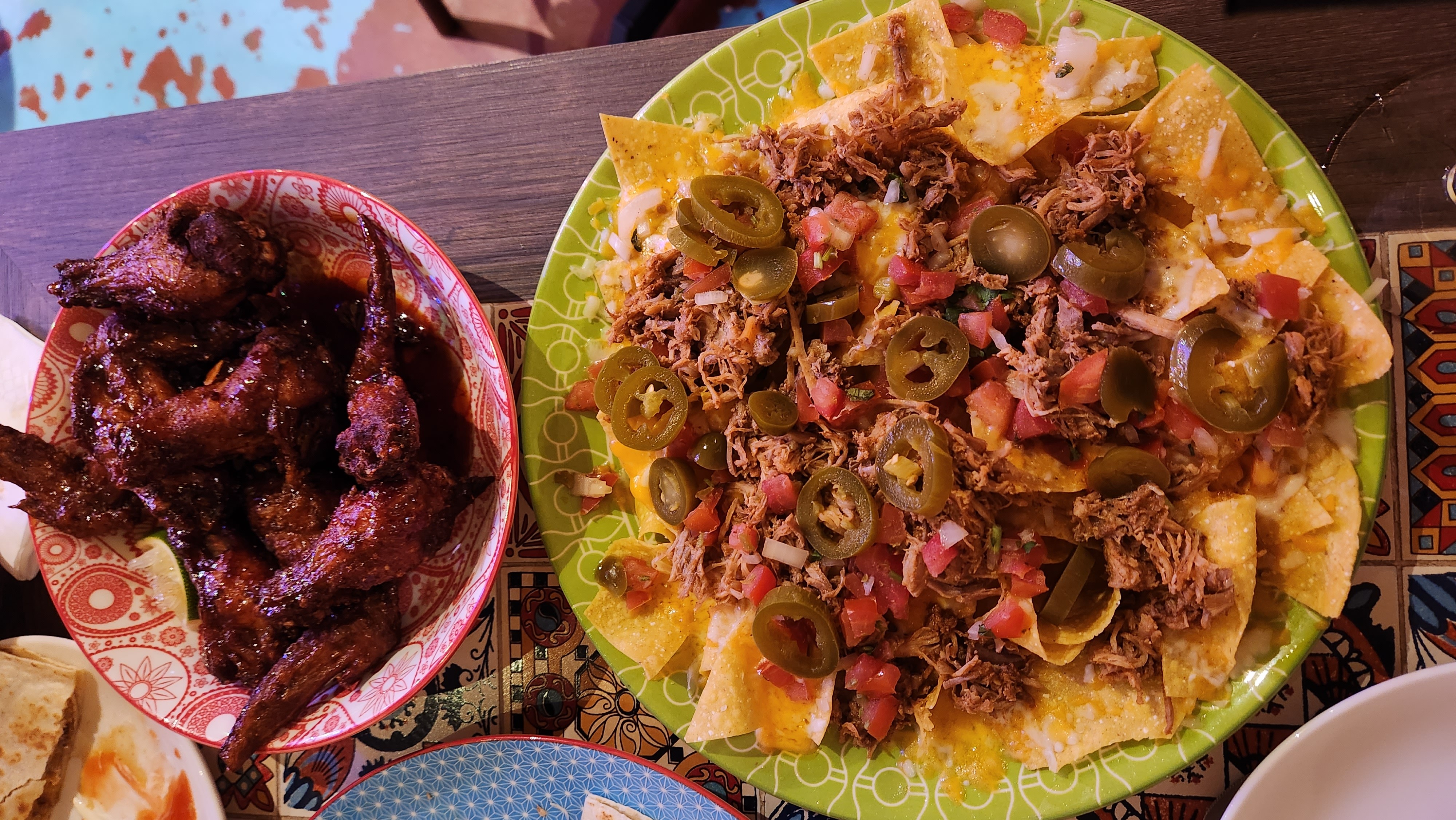 Loaded nachos and wings (shared)