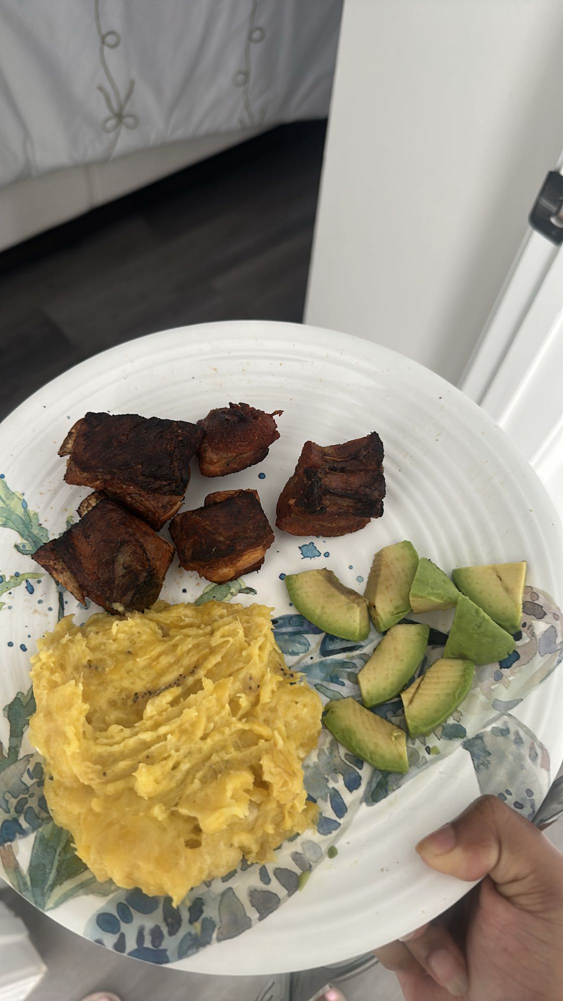 Pork, mashed plantain, avocado