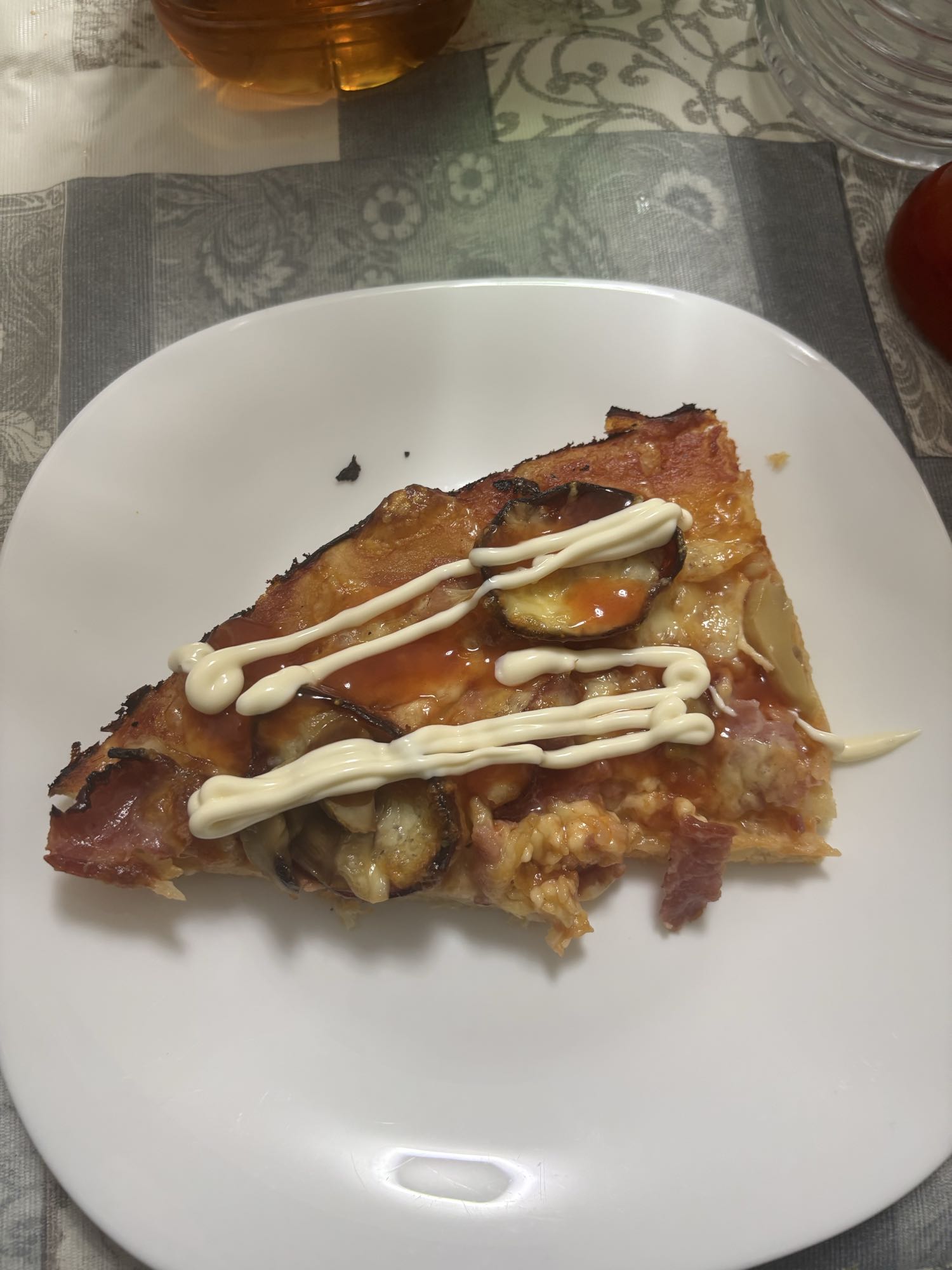 Slice of loaded pizza