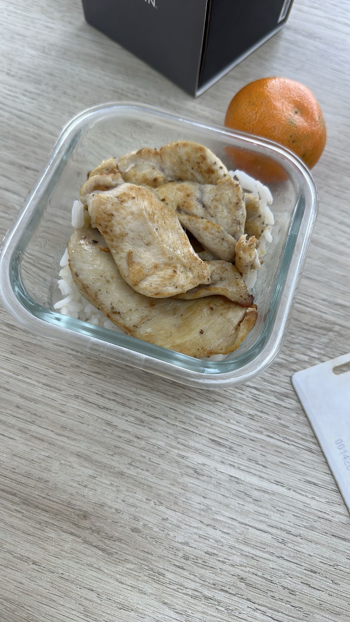 Pollo con arroz y mandarina