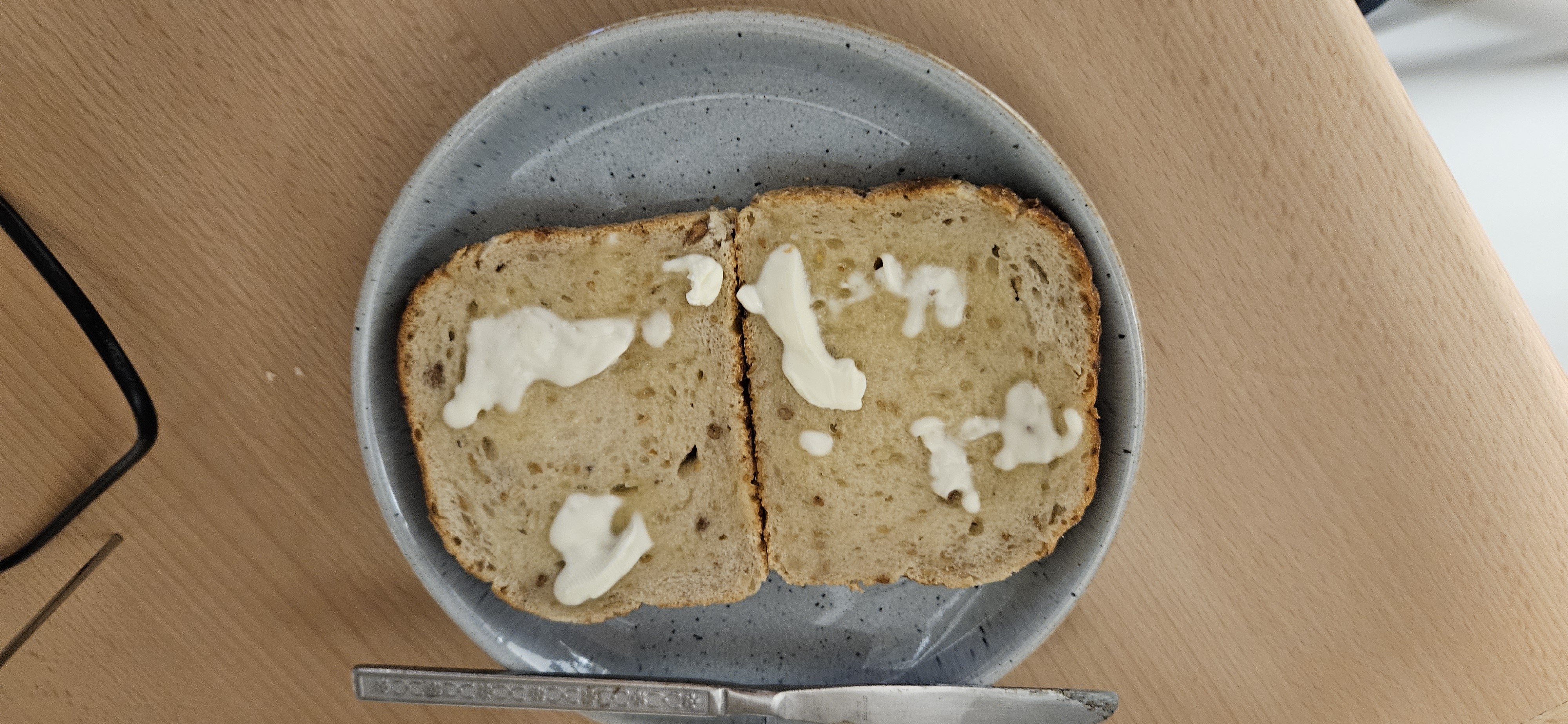 Butter on whole grain bread