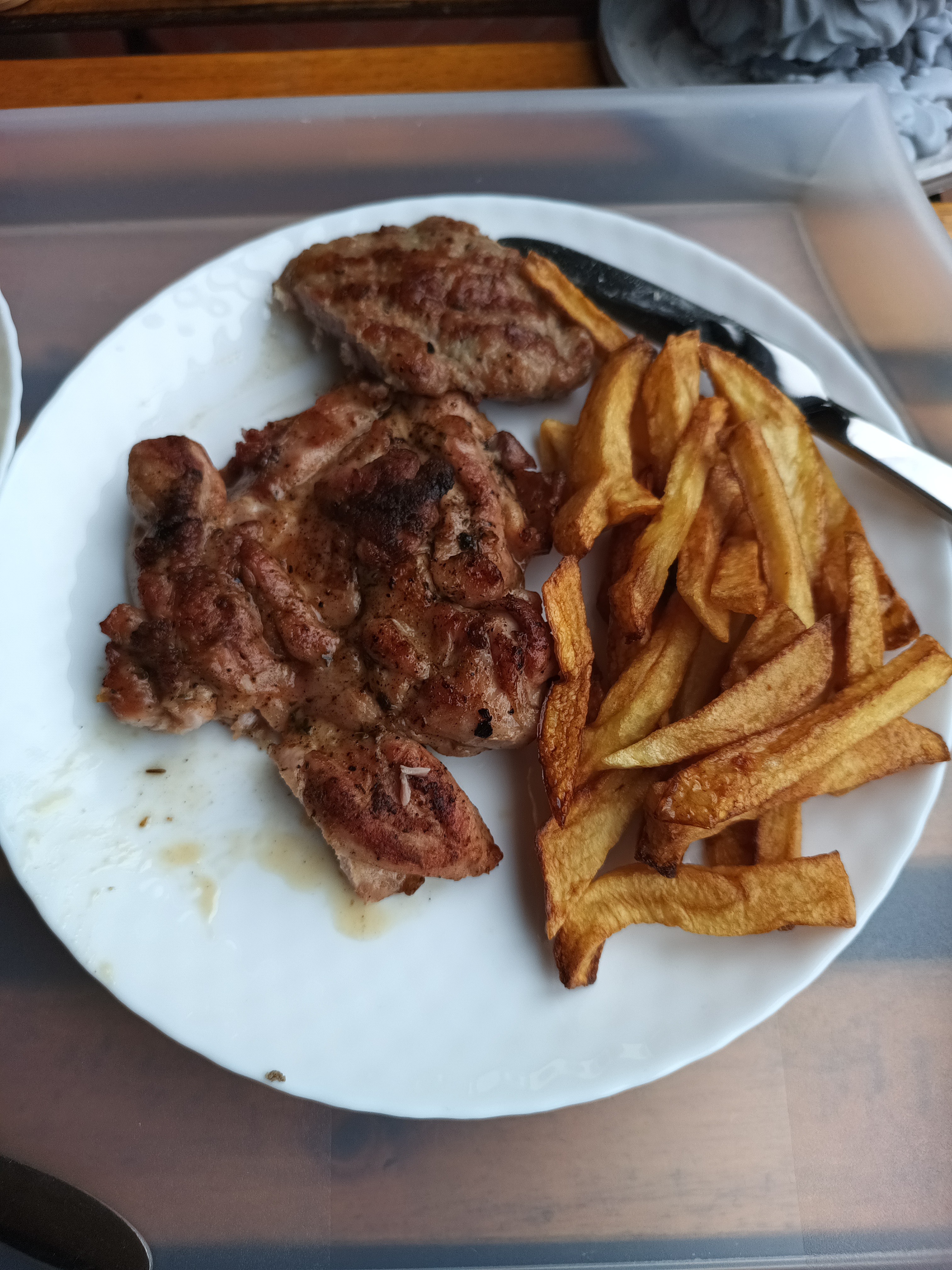 Grilled meat and fries