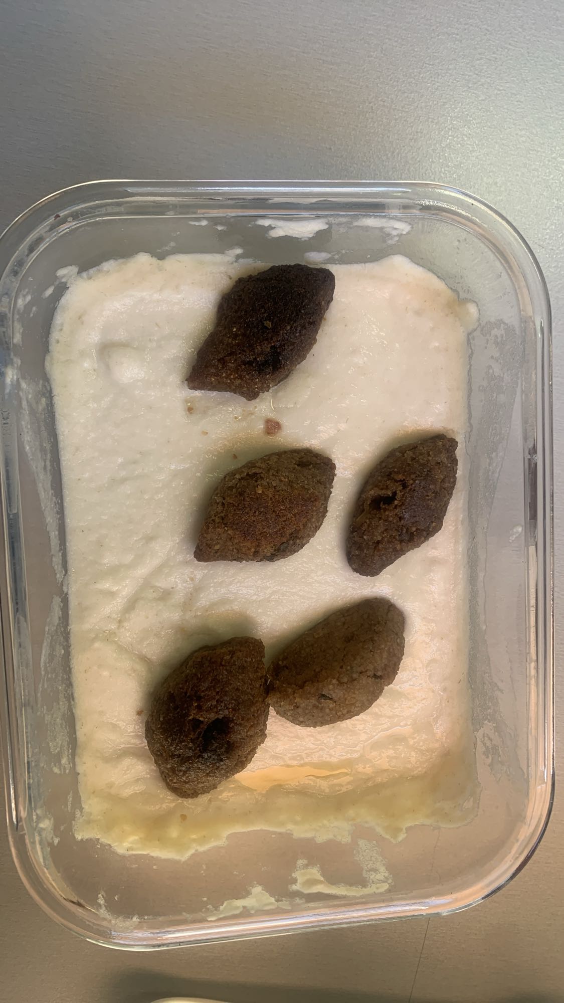 Kibbeh with yogurt sauce