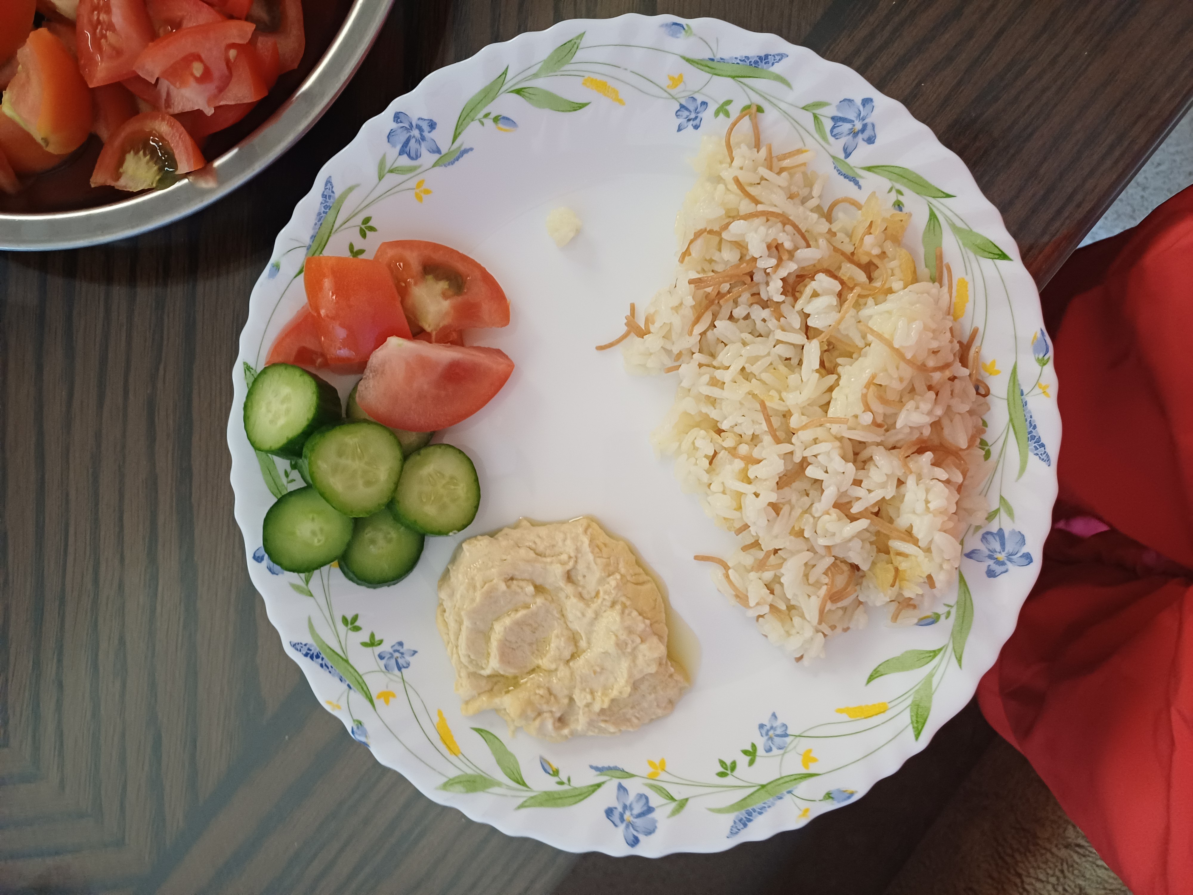 Rice, hummus, salad plate