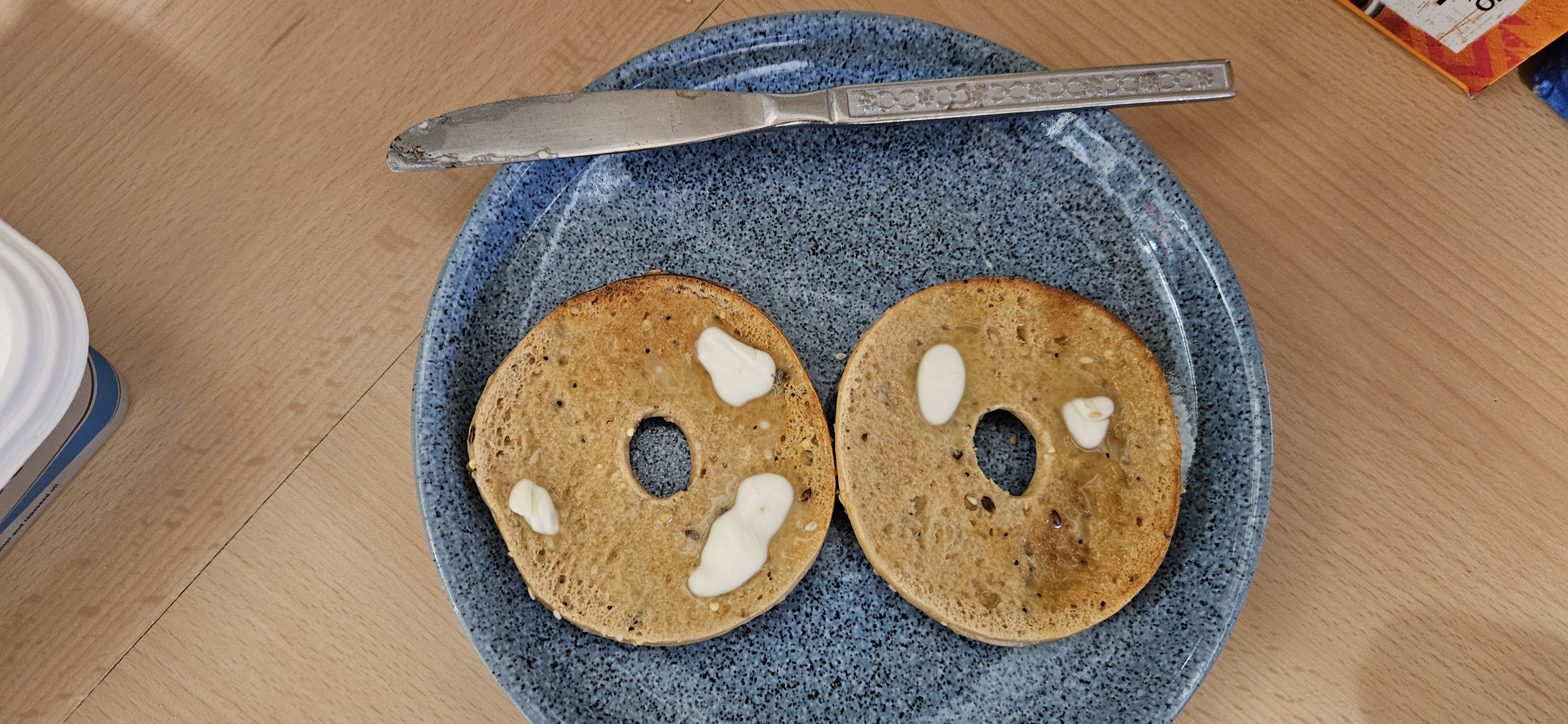High protein toasted bagel with butter