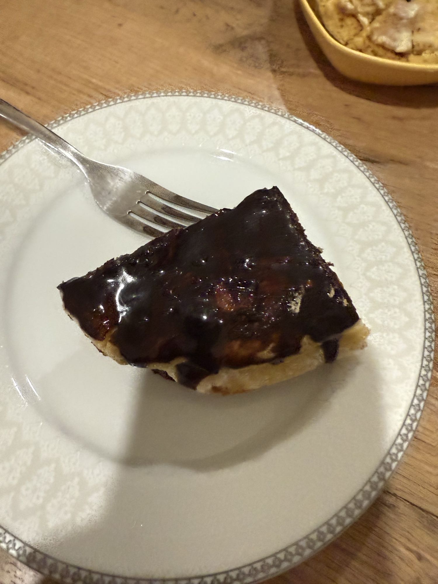 Chocolate covered cake slice