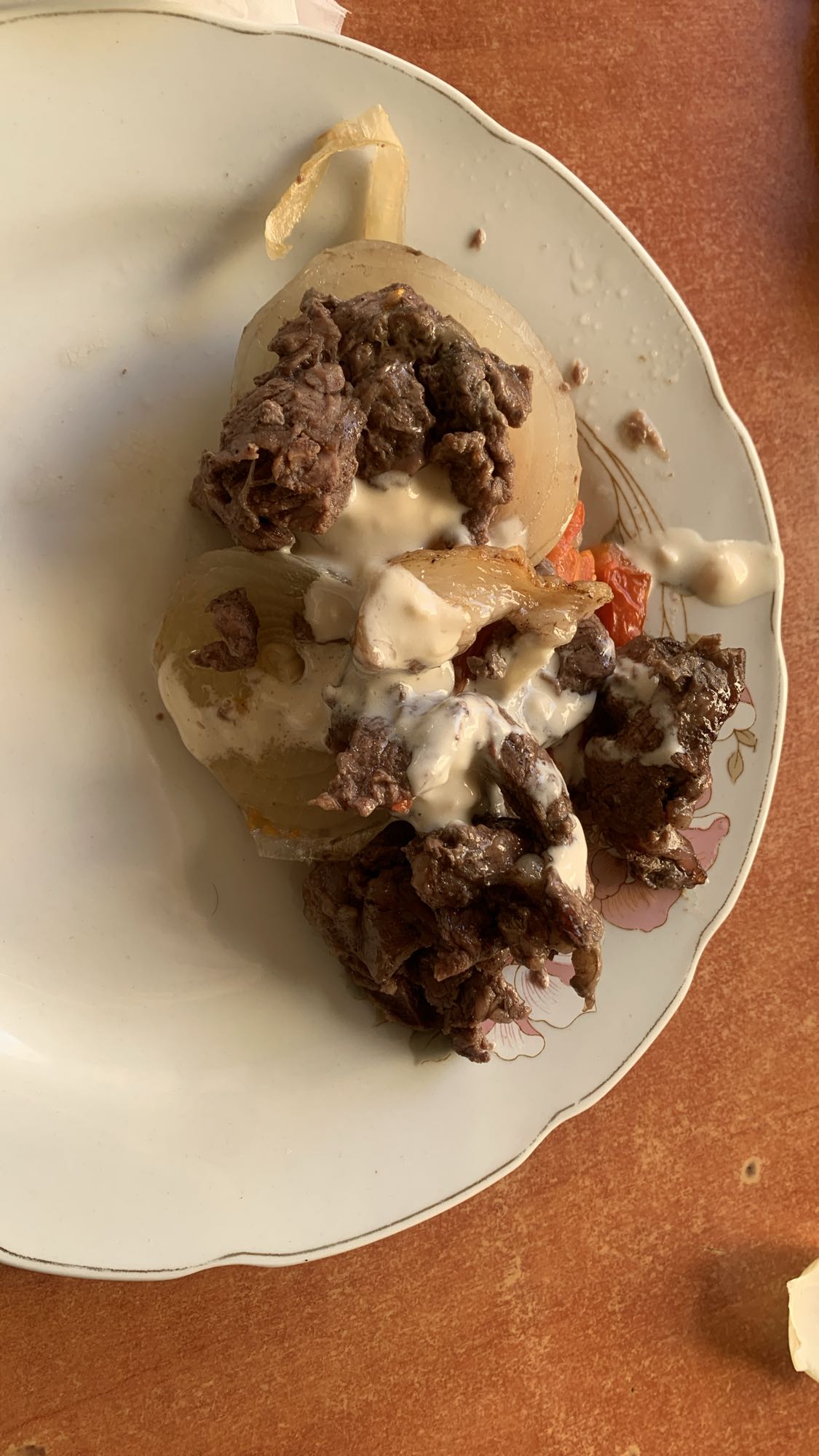 Beef with onion and sauce