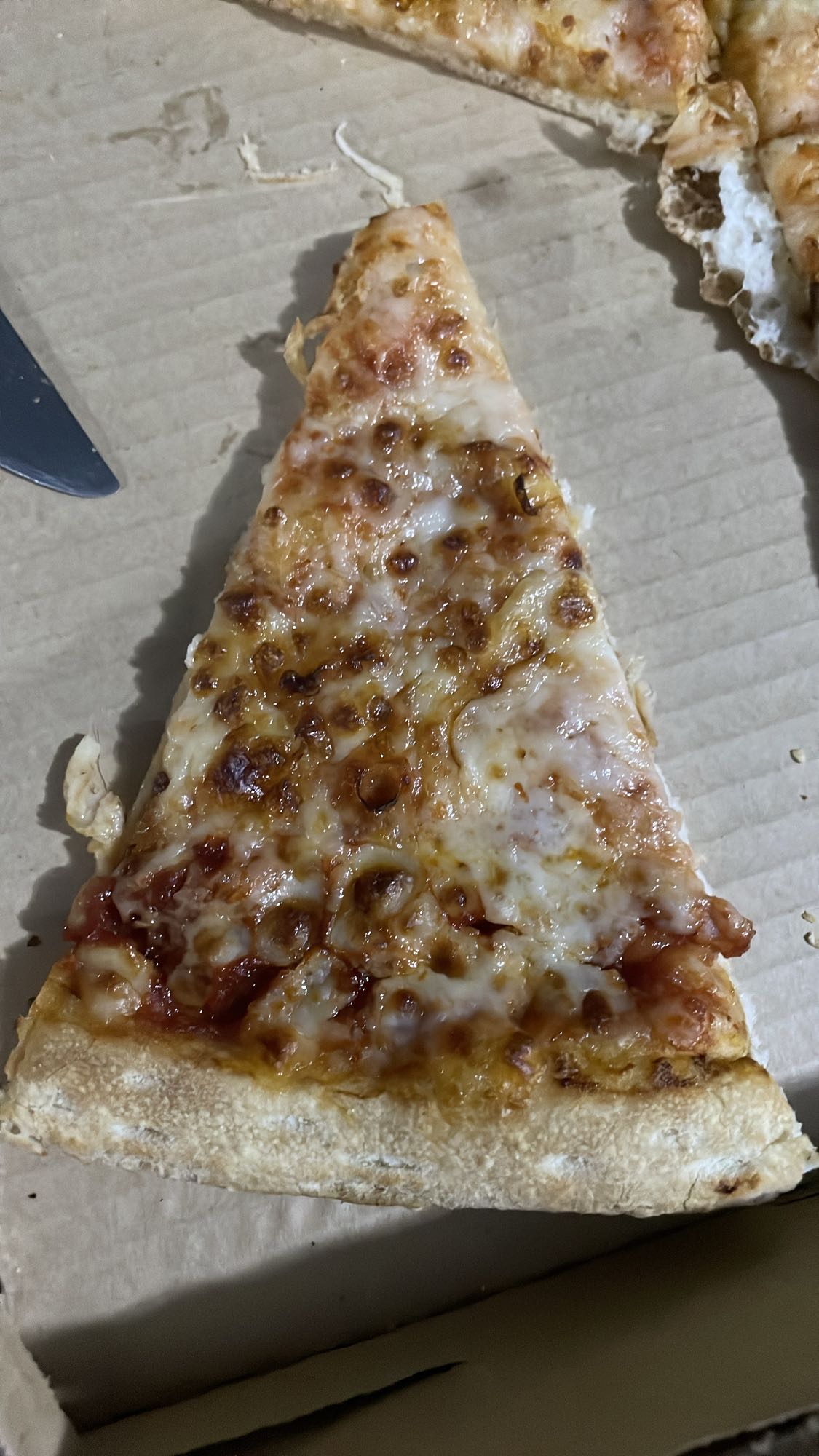 Rebanada de pizza de queso