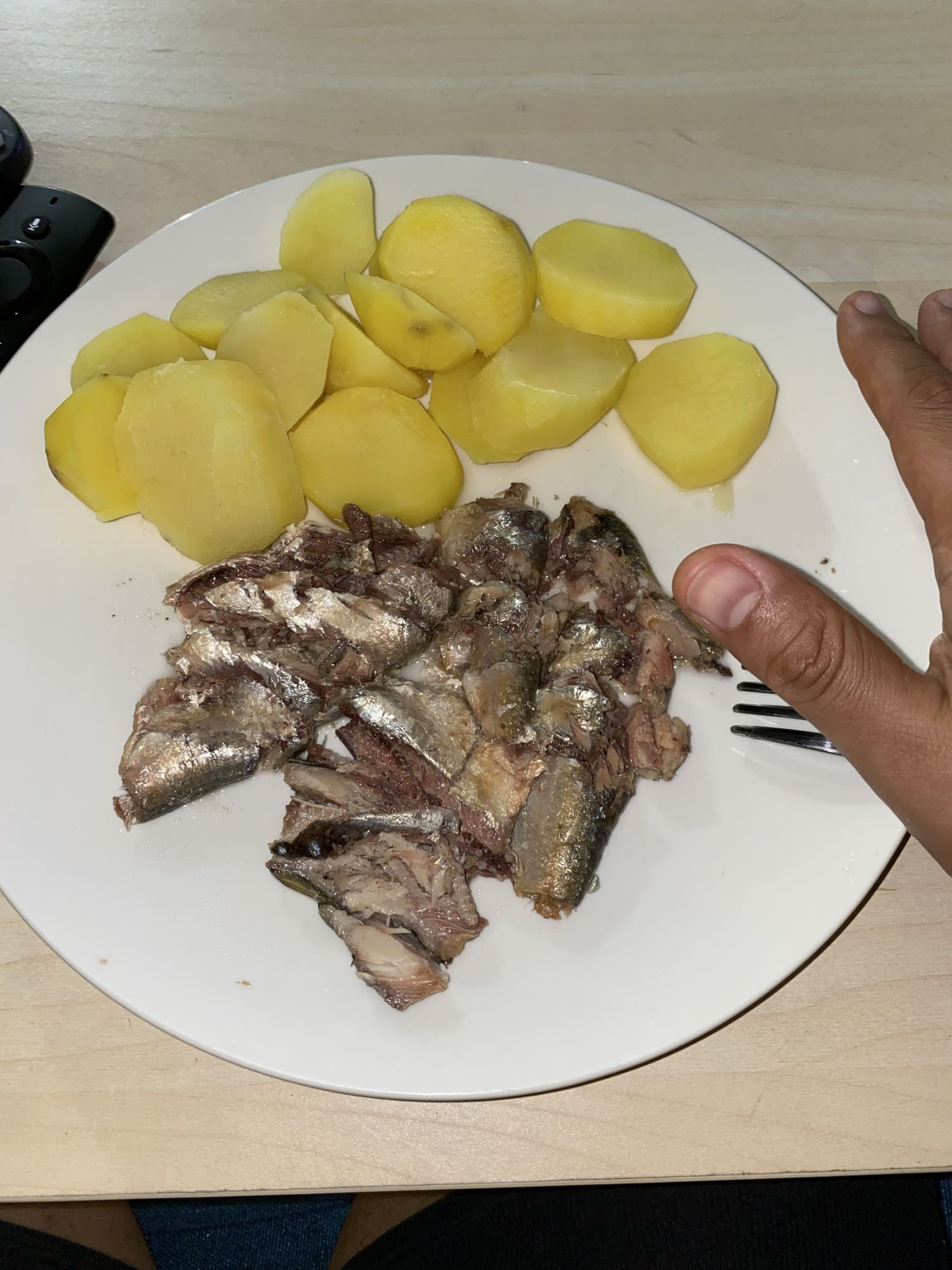 Papas y sardinas