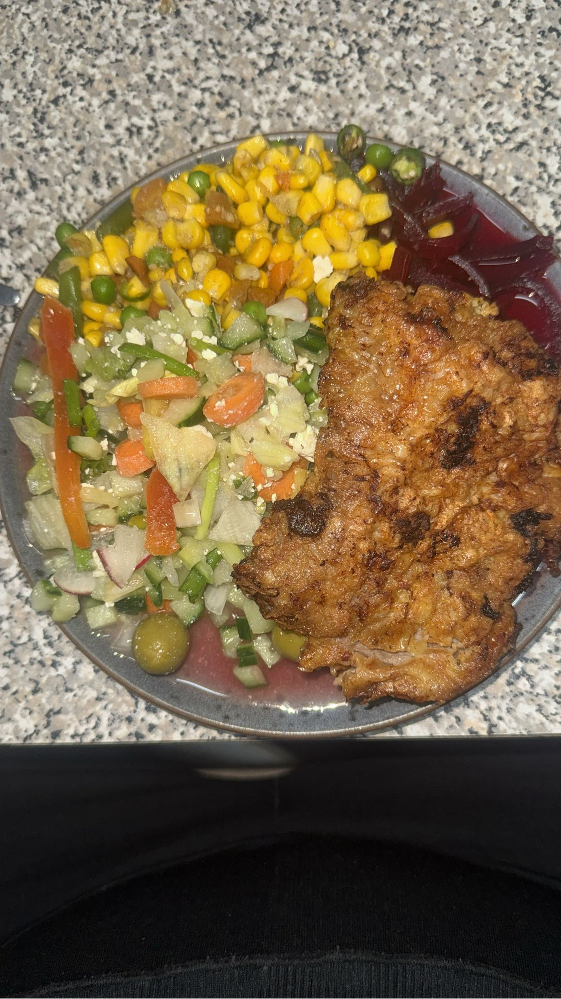 Fried steak with salad