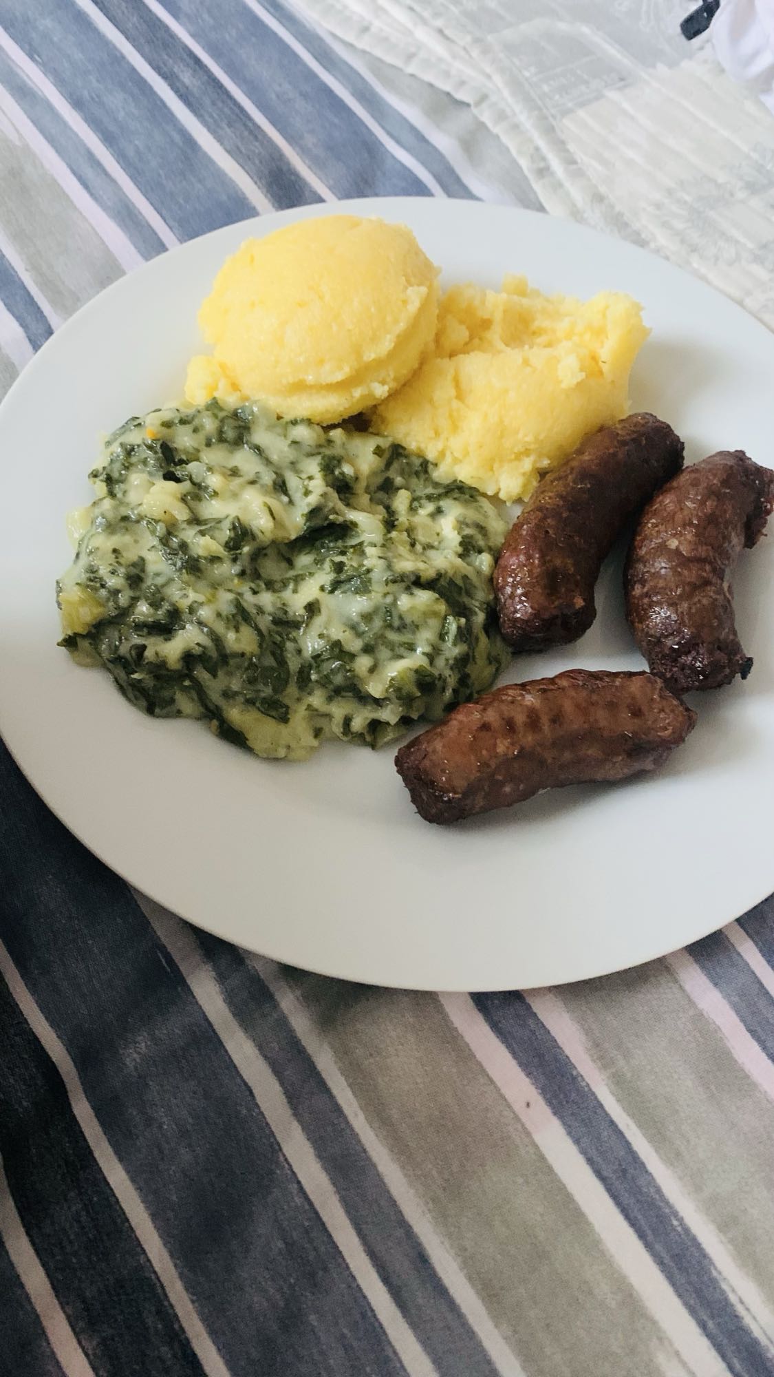 Polenta, spinach, sausages
