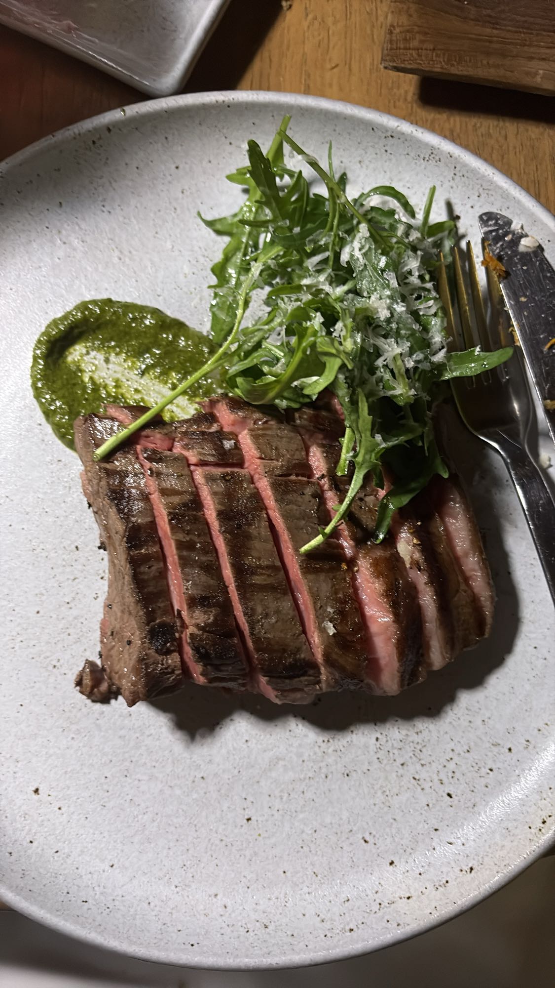 Grilled steak with arugula
